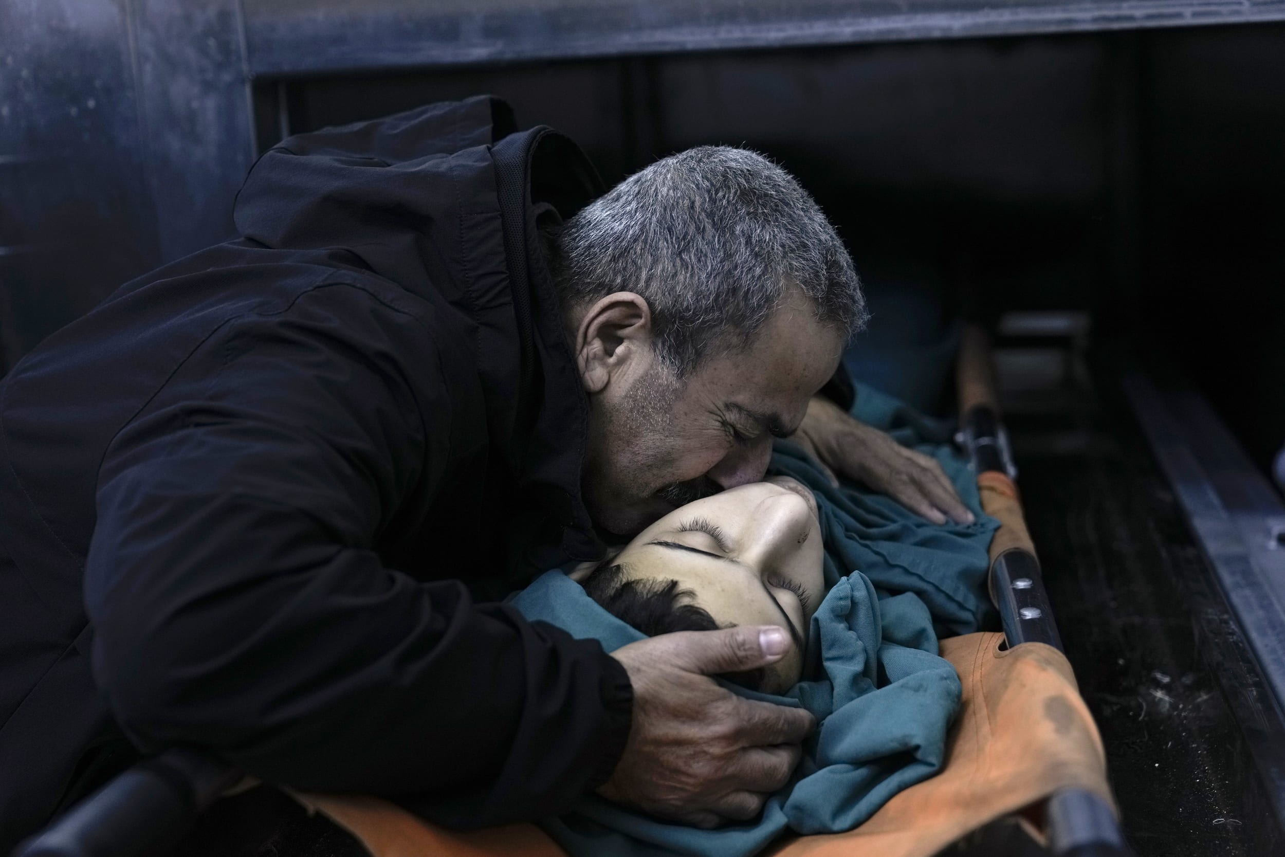A relative mourns 15-year-old Basil Abu Al-Wafa, who was killed during an Israeli military raid on Jenin refugee camp in the West Bank on Wednesday, Nov. 29, 2023.