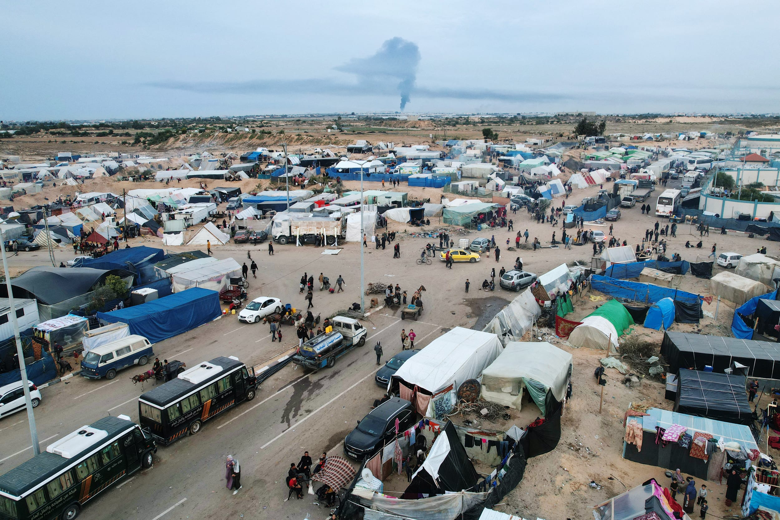 Displaced Palestinians who fled Khan Younis set up camp in Rafah near the Gaza Strip's border with Egypt on Dec. 7, 2023.