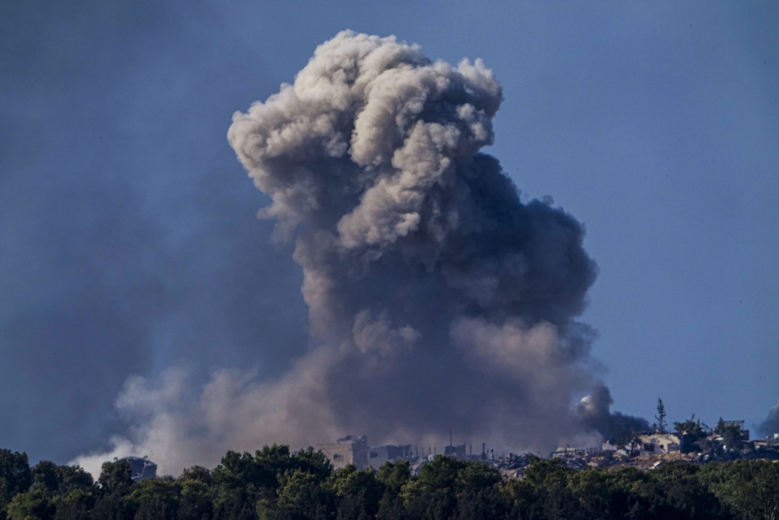 Smoke rises following an Israeli bombardment in the Gaza Strip, as seen from southern Israel