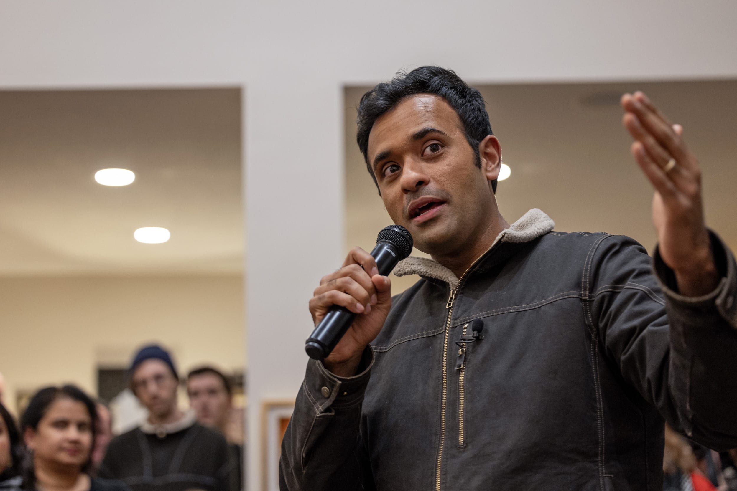 Republican presidential candidate Vivek Ramaswamy speaks to supporters during a campaign stop on Jan. 11, 2024 in Clive, Iowa. 