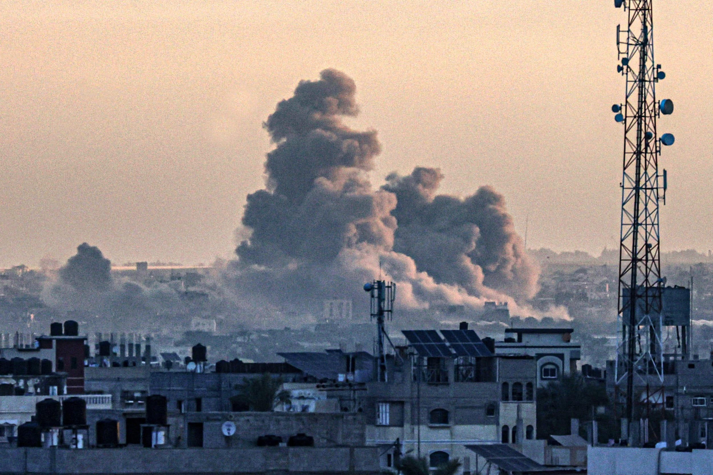 Smoke billows over Khan Younis in the southern Gaza Strip on Jan. 14, 2024.