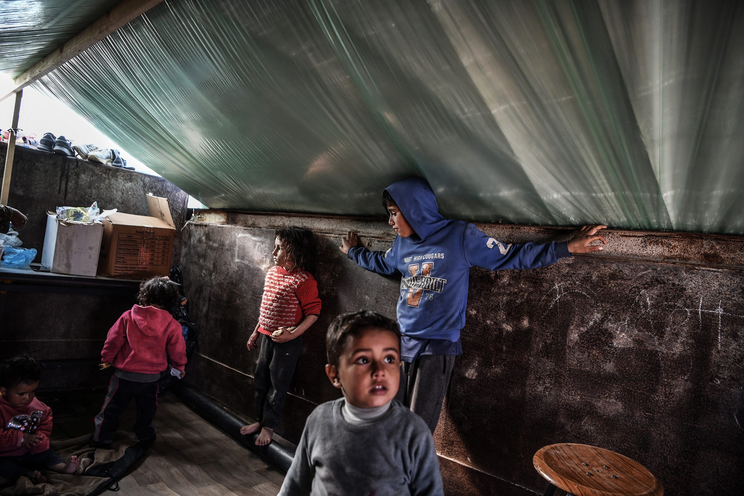 Palestinian family lives in an abandoned truck in Rafah