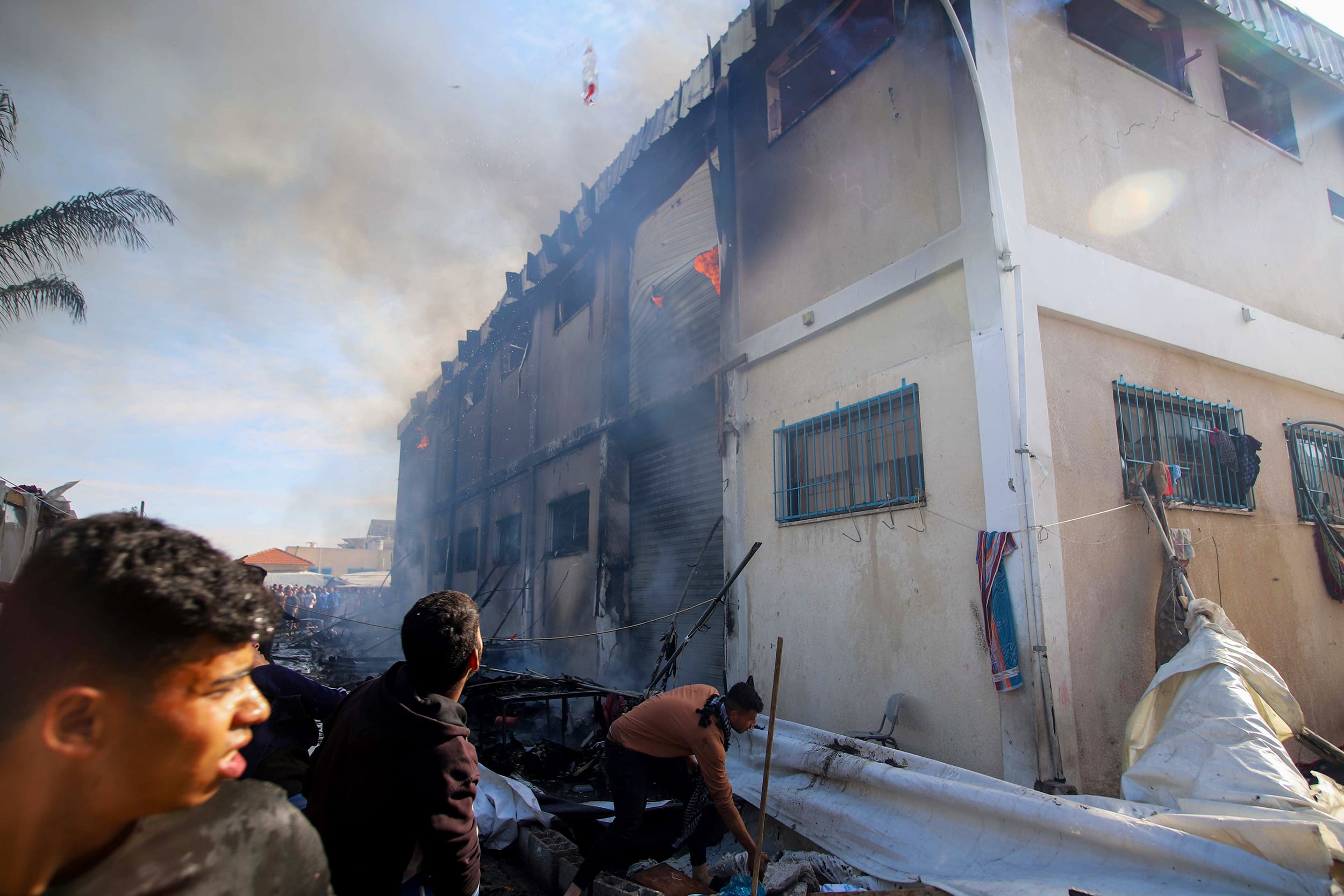 Israeli attacks hit UNRWA building housing displaced Palestinians in Khan Yunis