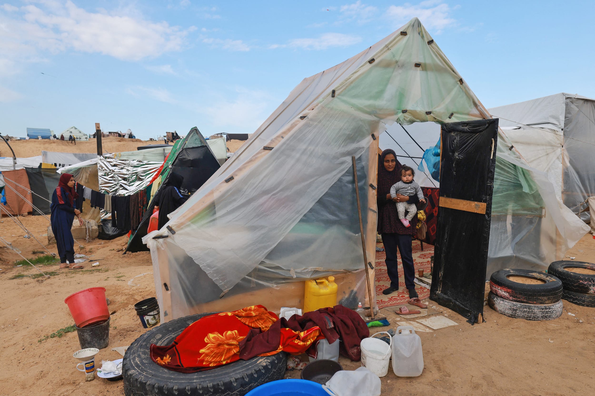 A Palestinian woman who fled Khan Younis at a camp for displaced in Rafah on Feb. 15, 2024.