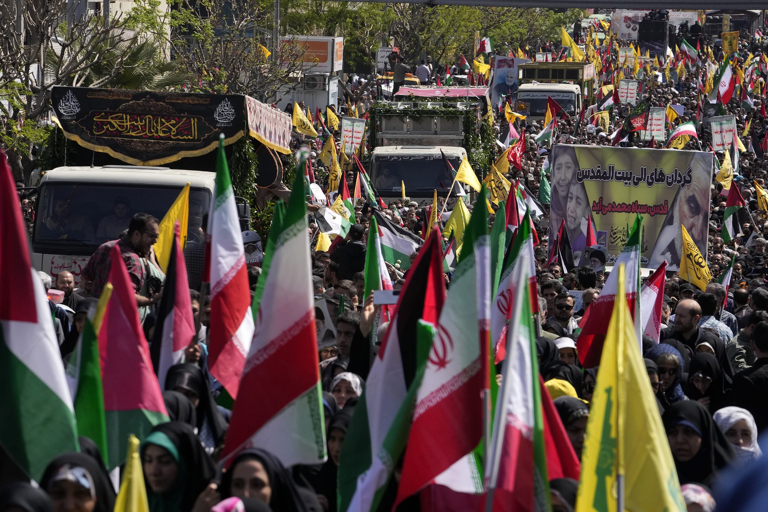 The public funeral coincided with Iran's annual rally Quds Day, or Jerusalem Day, a traditional show of support for the Palestinians that has been held on the last Friday of the holy month of Ramadan since the 1979 Islamic Revolution.