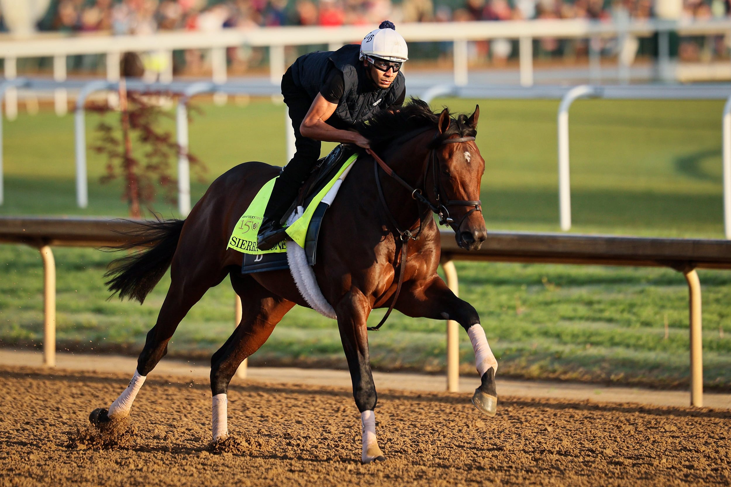 Sierra Leone runs on the track.