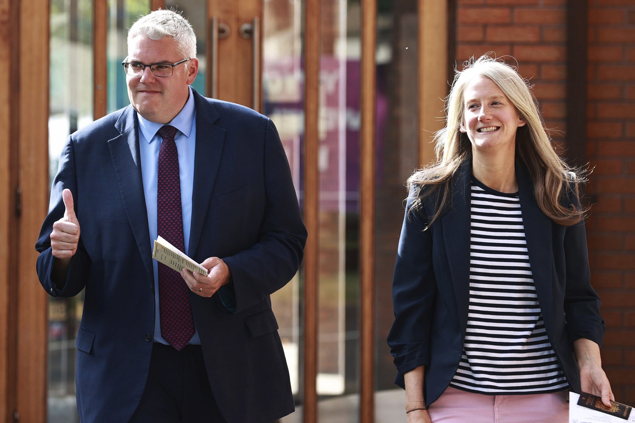 DUP leader Gavin Robinson gives the thumbs up after after casting his vote in Belfast, Northern Ireland, Thursday July 4, 2024. 