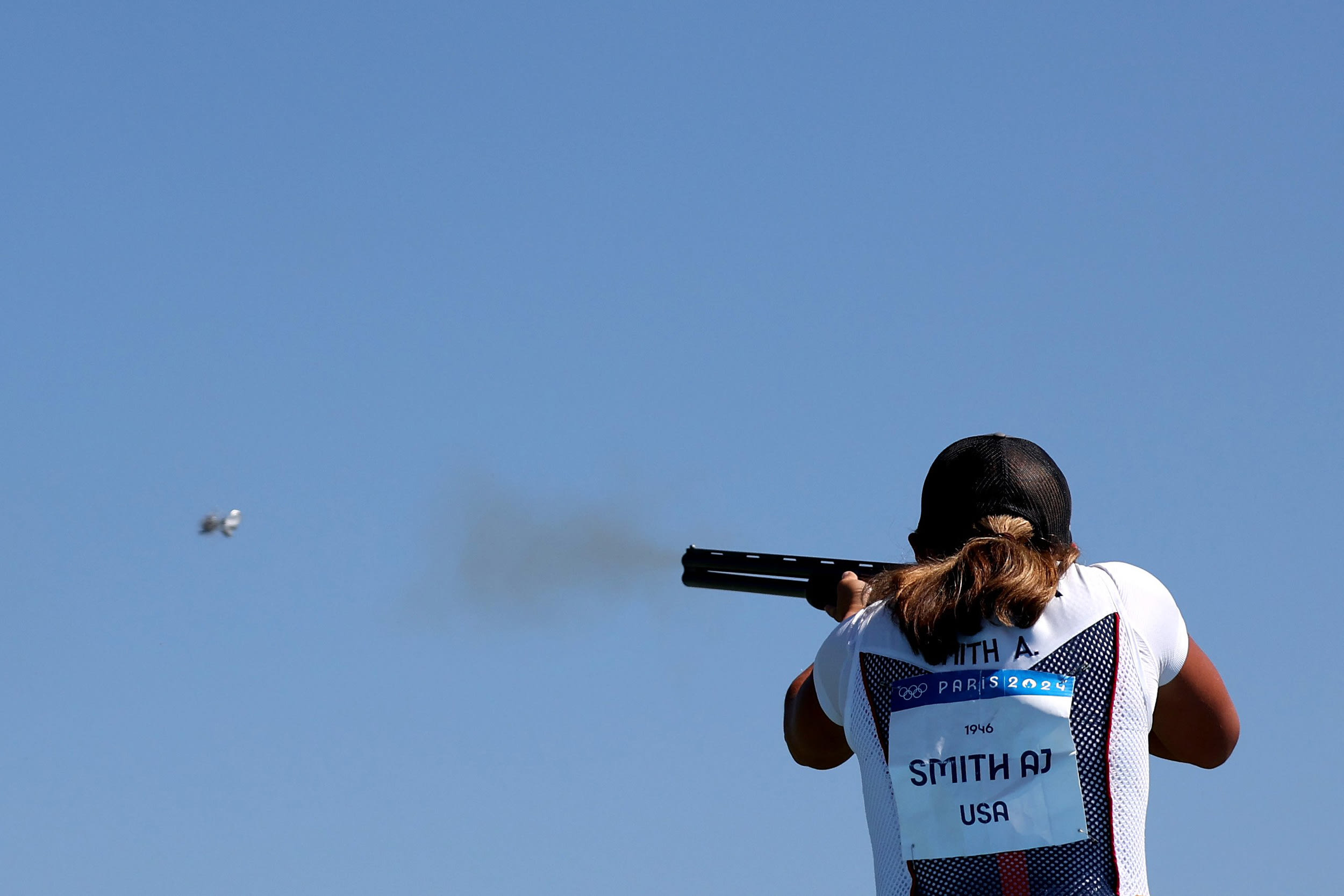 Austen Jewell Smith of the United States competes in mixed skeet at the Olympics on Aug. 5, 2024 in Chateauroux, France. 