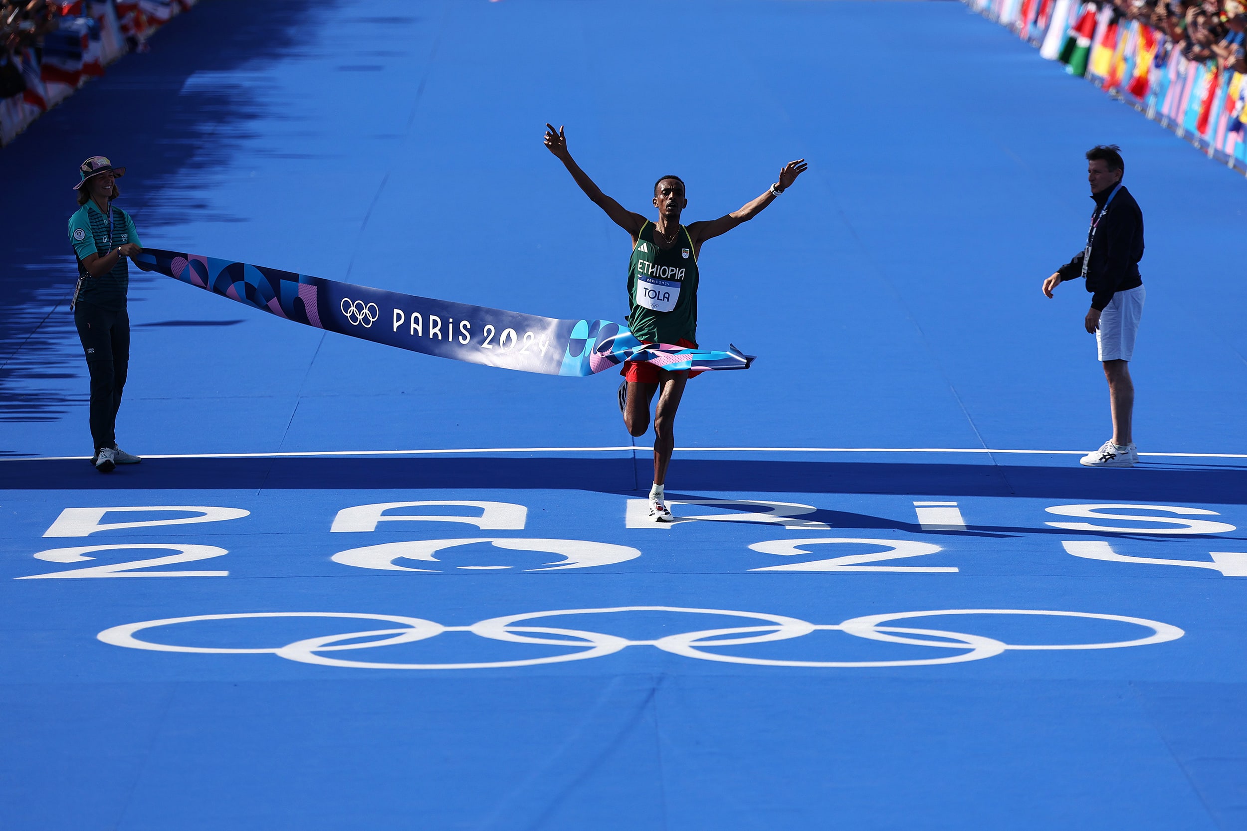 Ethiopia's Tamirat Tola wins the men's marathon at the Paris 2024 Olympic Games at Esplanade Des Invalides on August 10, 2024 in Paris, France.