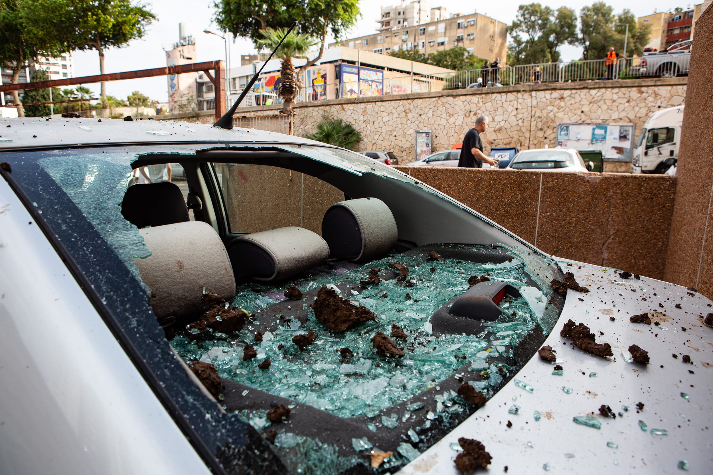 Several people are reported wounded, and the apparent Hezbollah attack also causes damage to homes and vehicles. 