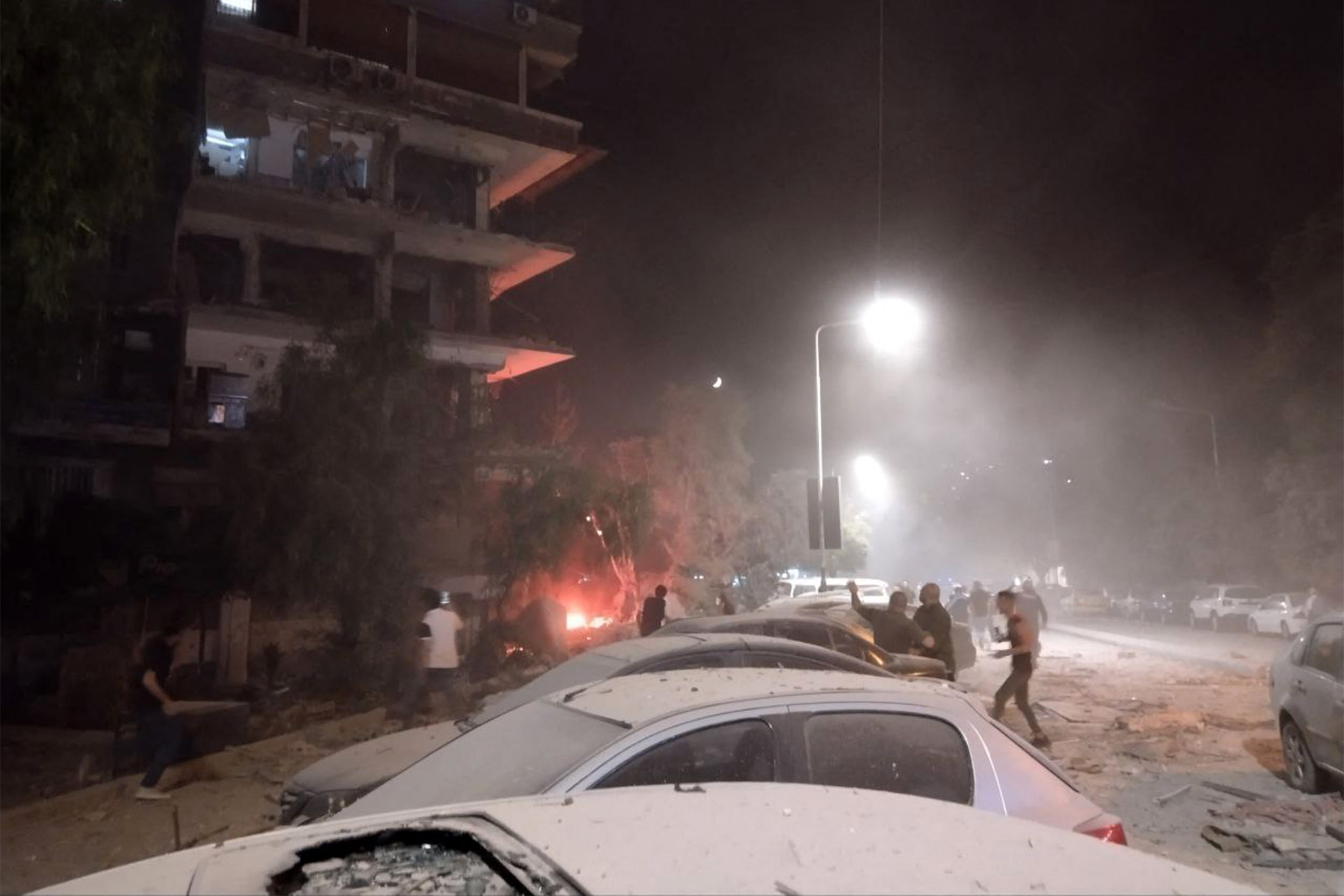 The site of a reported Israeli airstrike on a residential building in Damascus