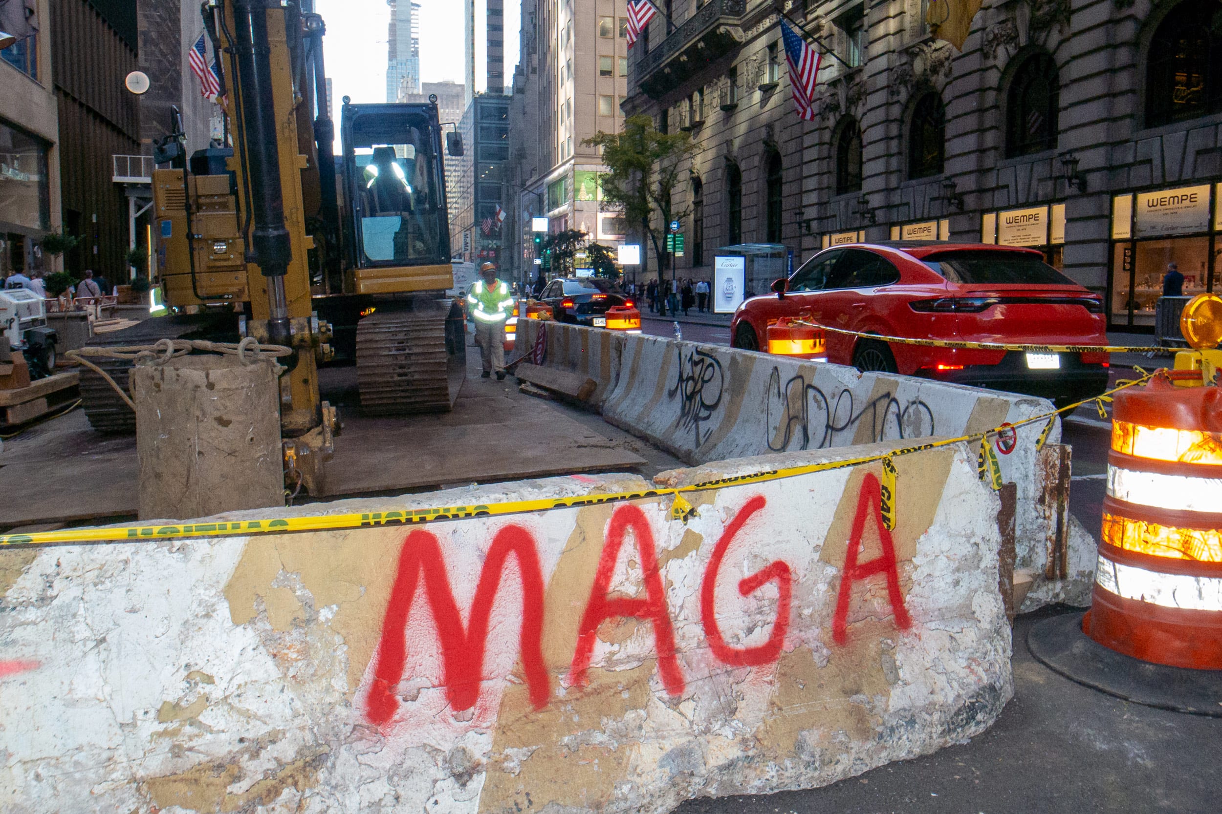 Mega spray painted along a construction site