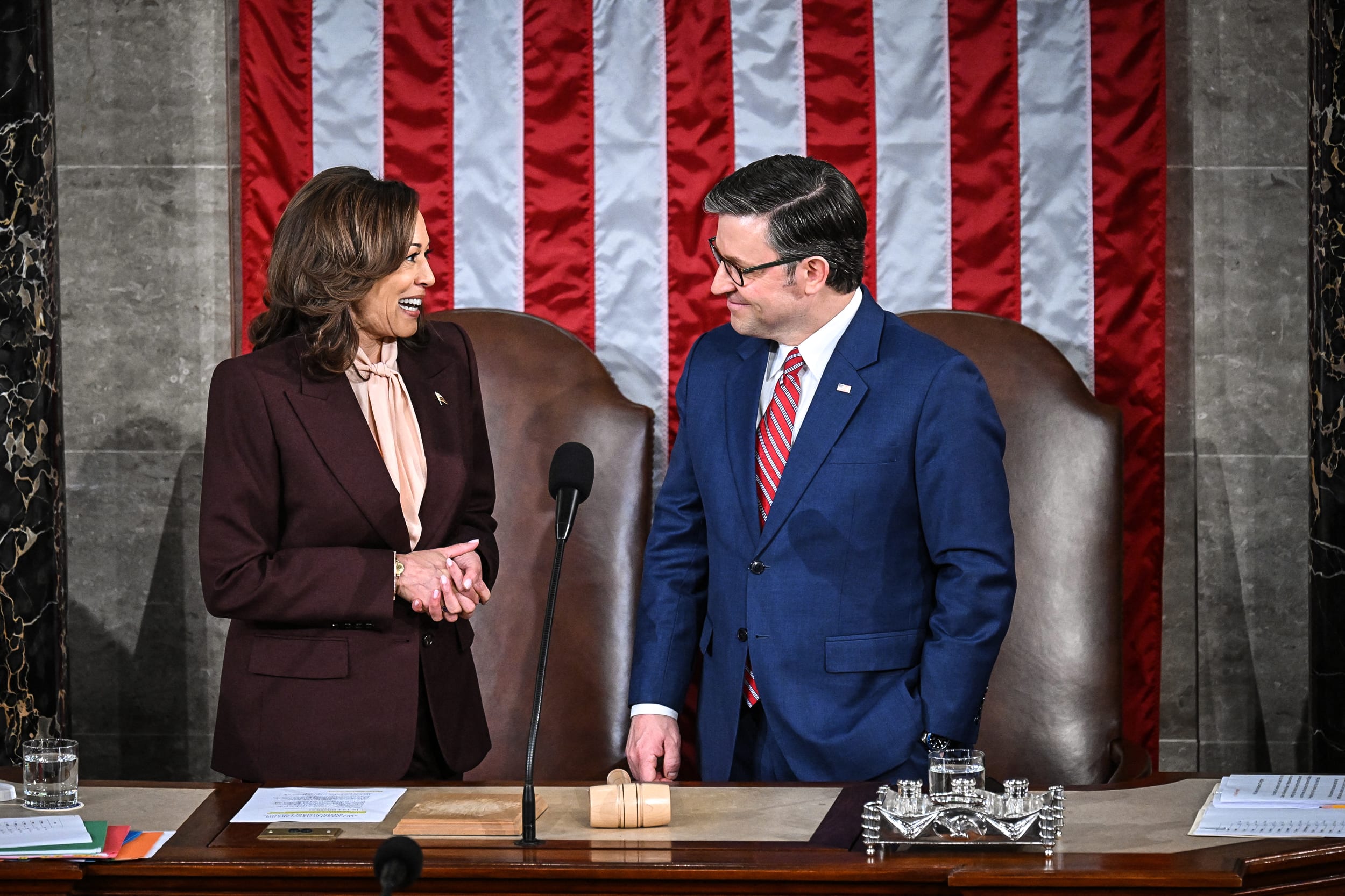 Image: Vice President Kamala Harris speaks with Speaker of the House Mike Johnson