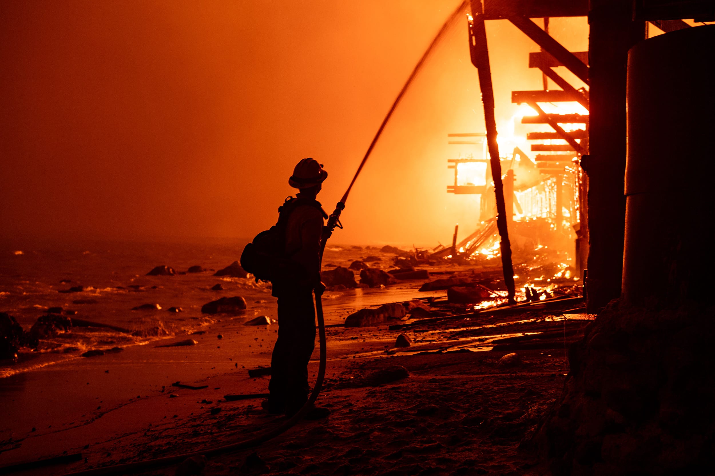 Malibu beachfront homes go up in flames as the Palisades fire reaches the pacific ocean