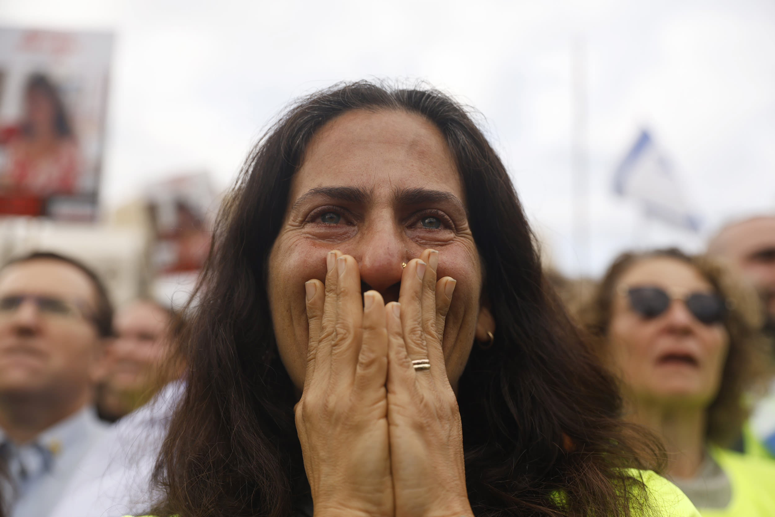 People react ahead of the release of four Israeli hostages on Jan. 25, 2025 in Tel Aviv, Israel. 