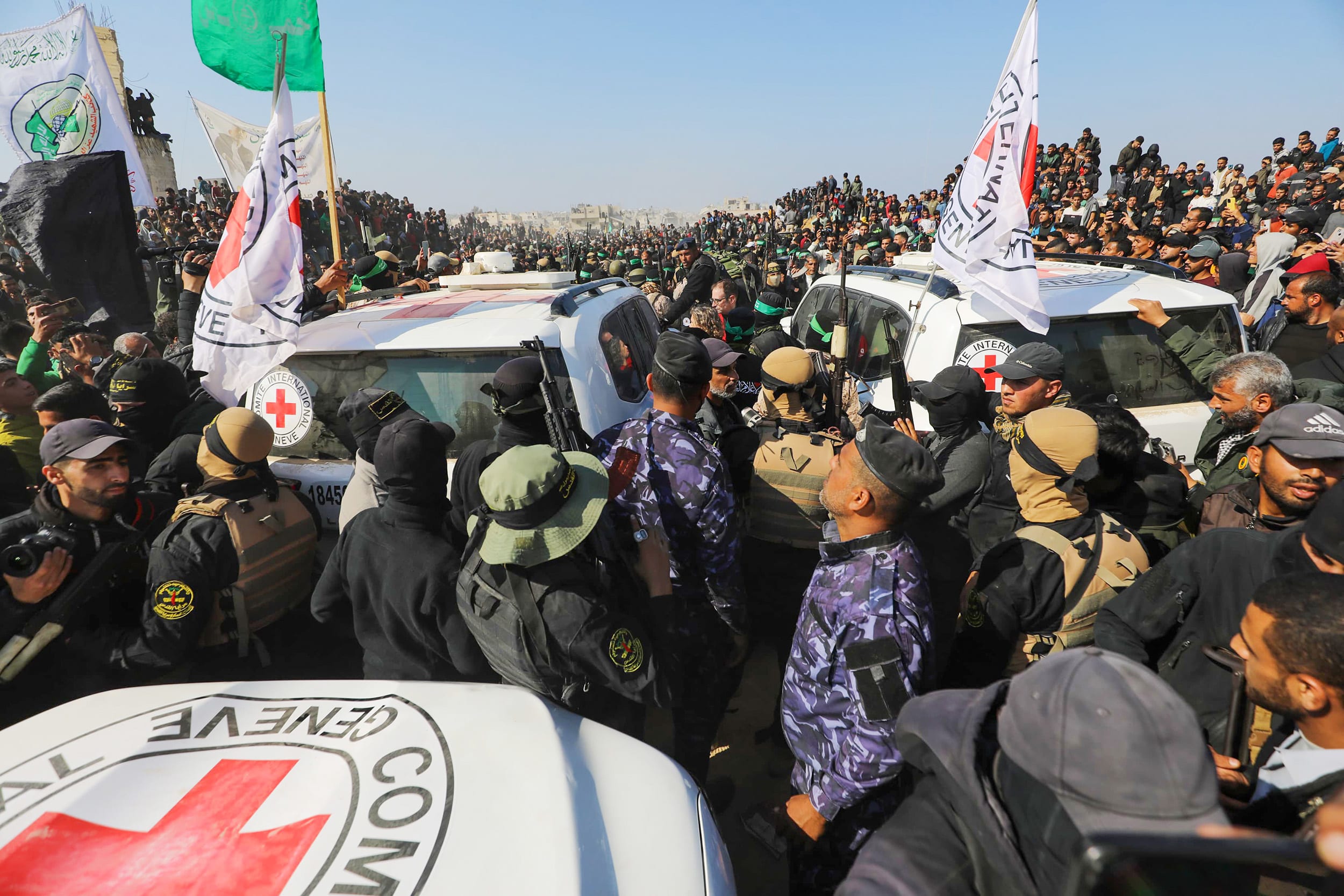 1 Israeli female hostage held in Gaza handed over to Red Cross teams
