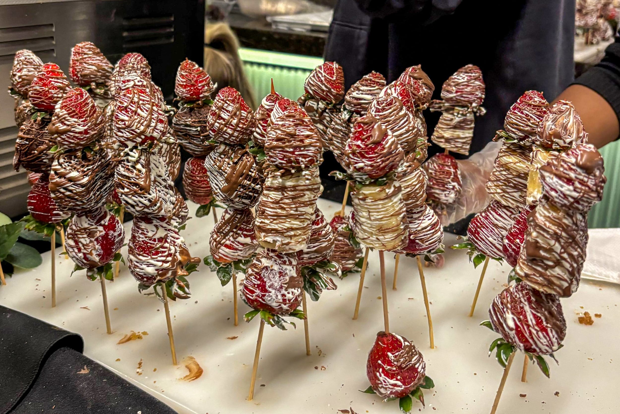 Strawberry and banana kabobs at the dessert table.