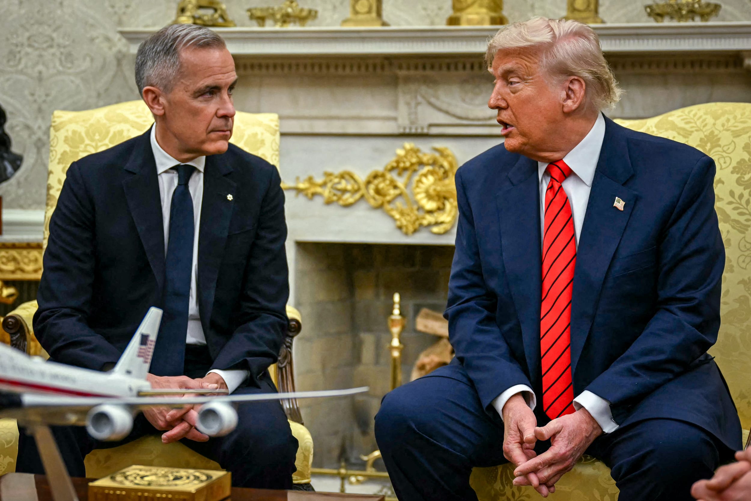 Mark Carney and Donald Trump.