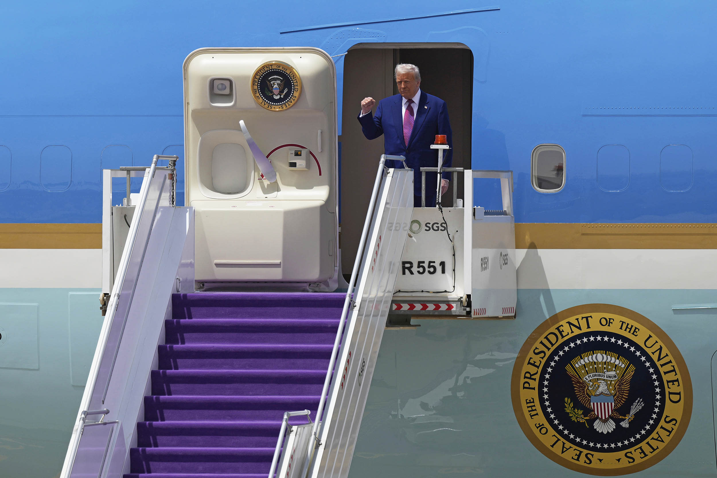 President Donald Trump arrives on Air Force One at King Khalid International Airport Royal Terminal in Riyadh.