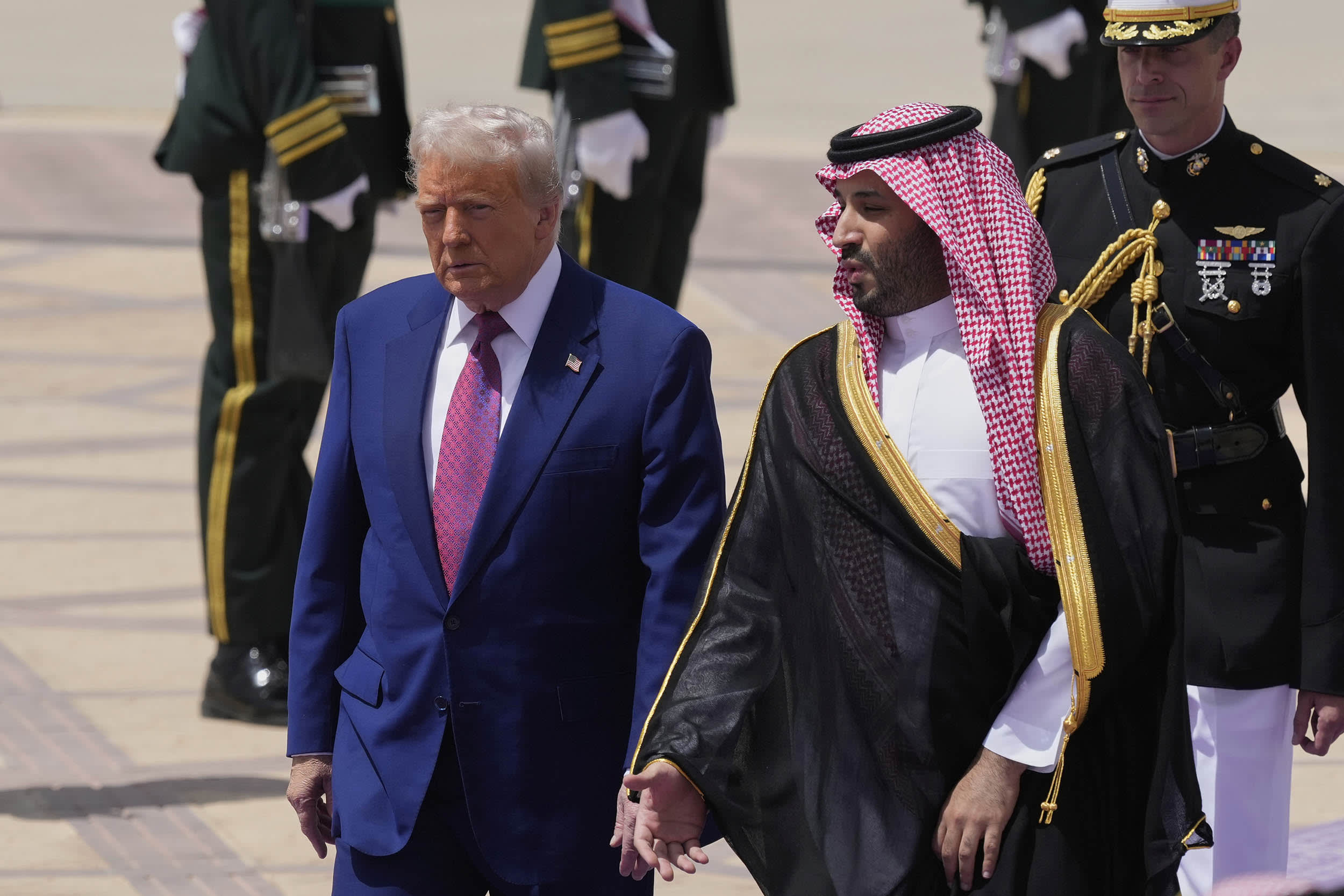 Donald Trump speaks with Saudi Crown Prince Mohammed bin Salman during an arrival ceremony at the Royal Terminal of King Khalid International Airport in Riyadh