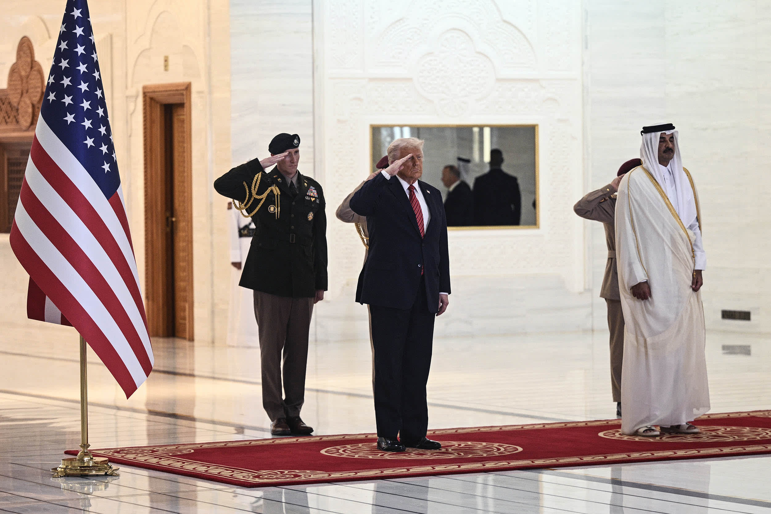 Qatar's Emir Sheikh Tamim bin Hamad al-Thani welcomes US President Donald Trump in the Qatari capital Doha