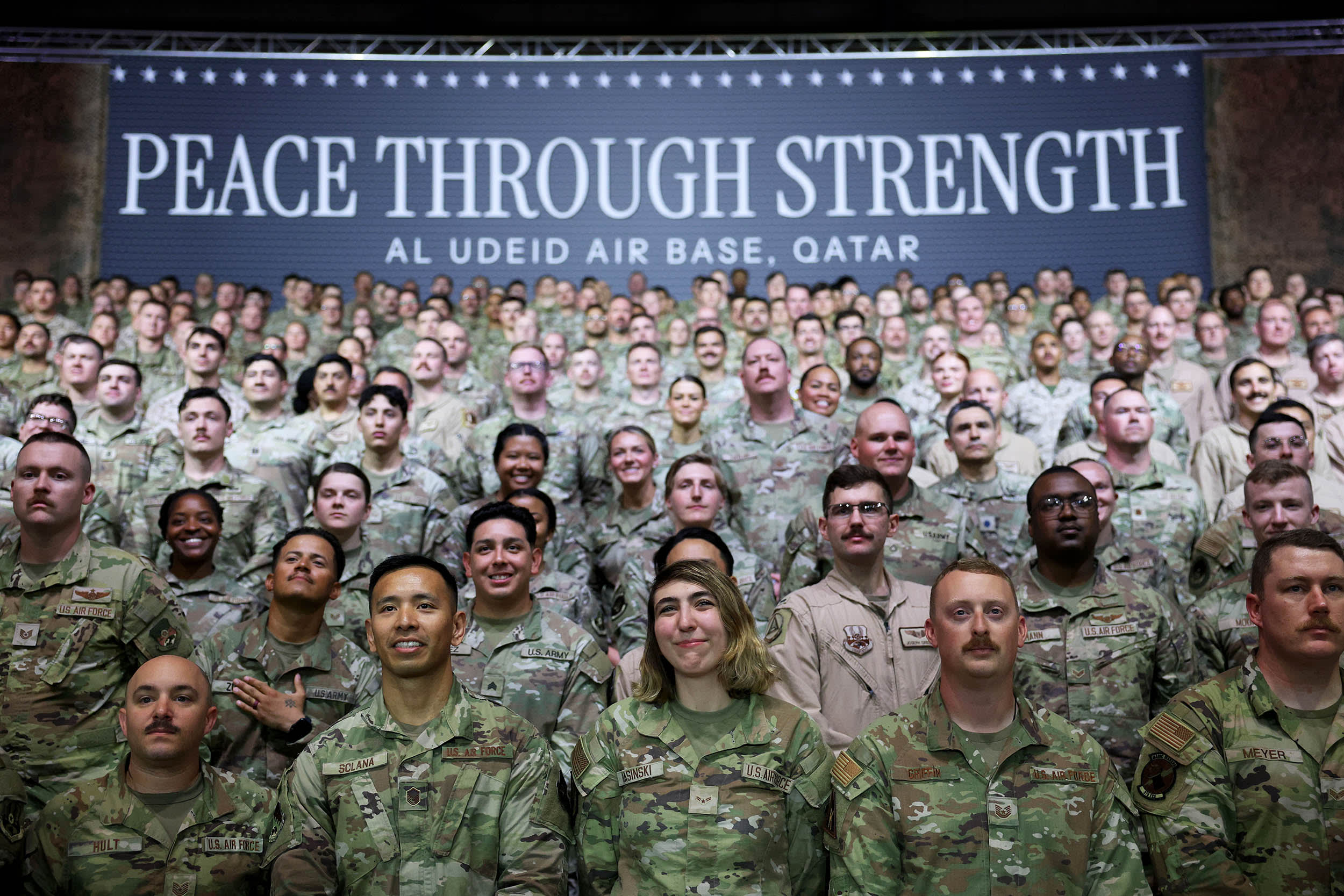 Military personnel wait for Trump's address