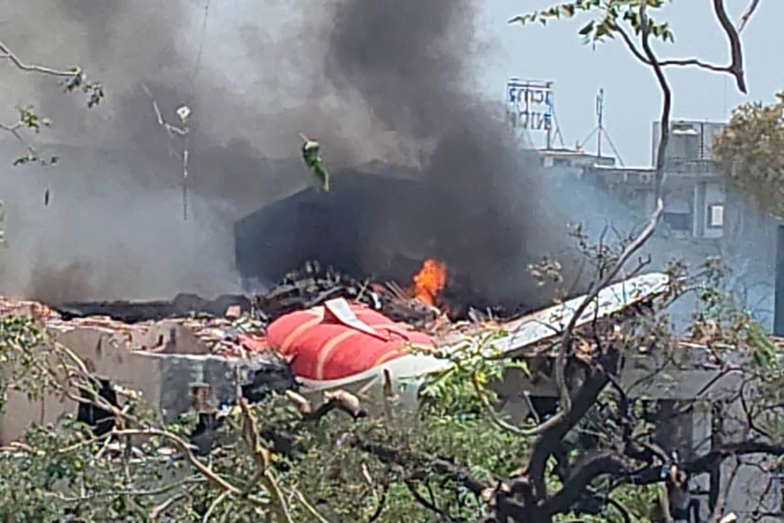 Smartphone image taken by local residents captures the moment an Air India plane with at least 242 people on board that was