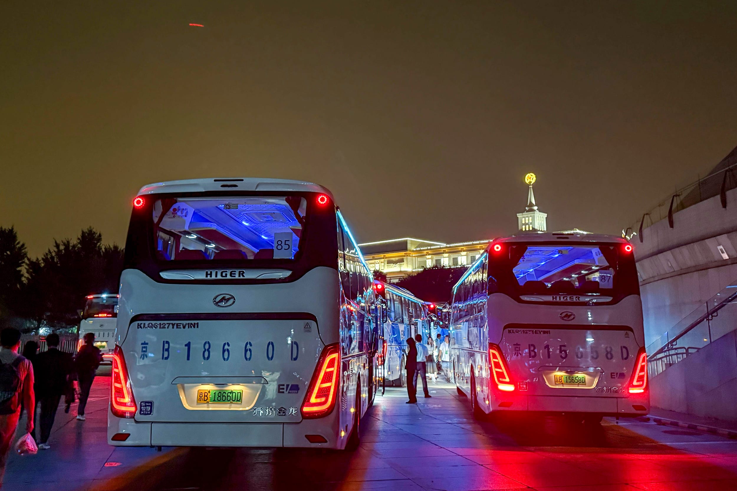 Designated buses for journalists to enter the square.