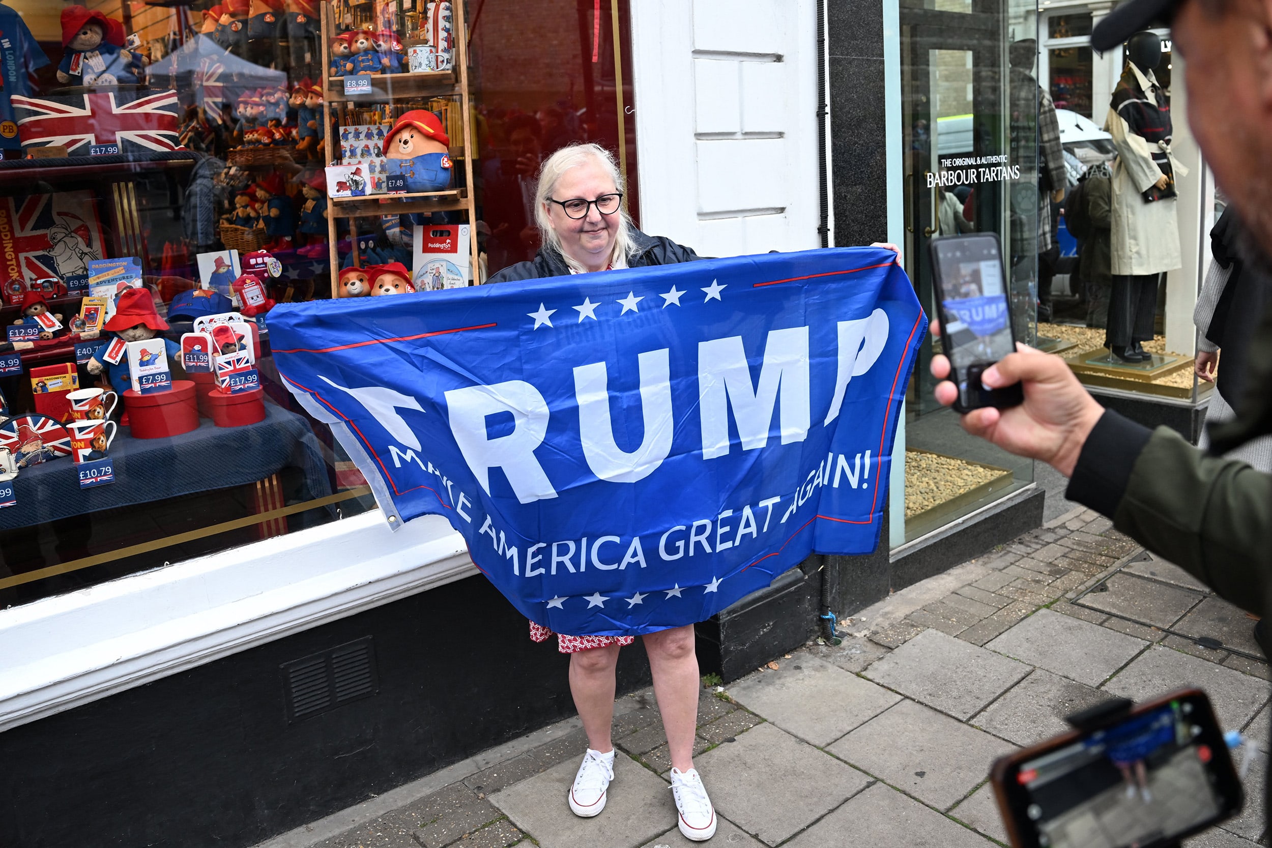 US President Donald Trump arrived in Britain on Tuesday for an unprecedented second state visit, with the UK government rolling out a royal red carpet welcome to win over the mercurial leader. 