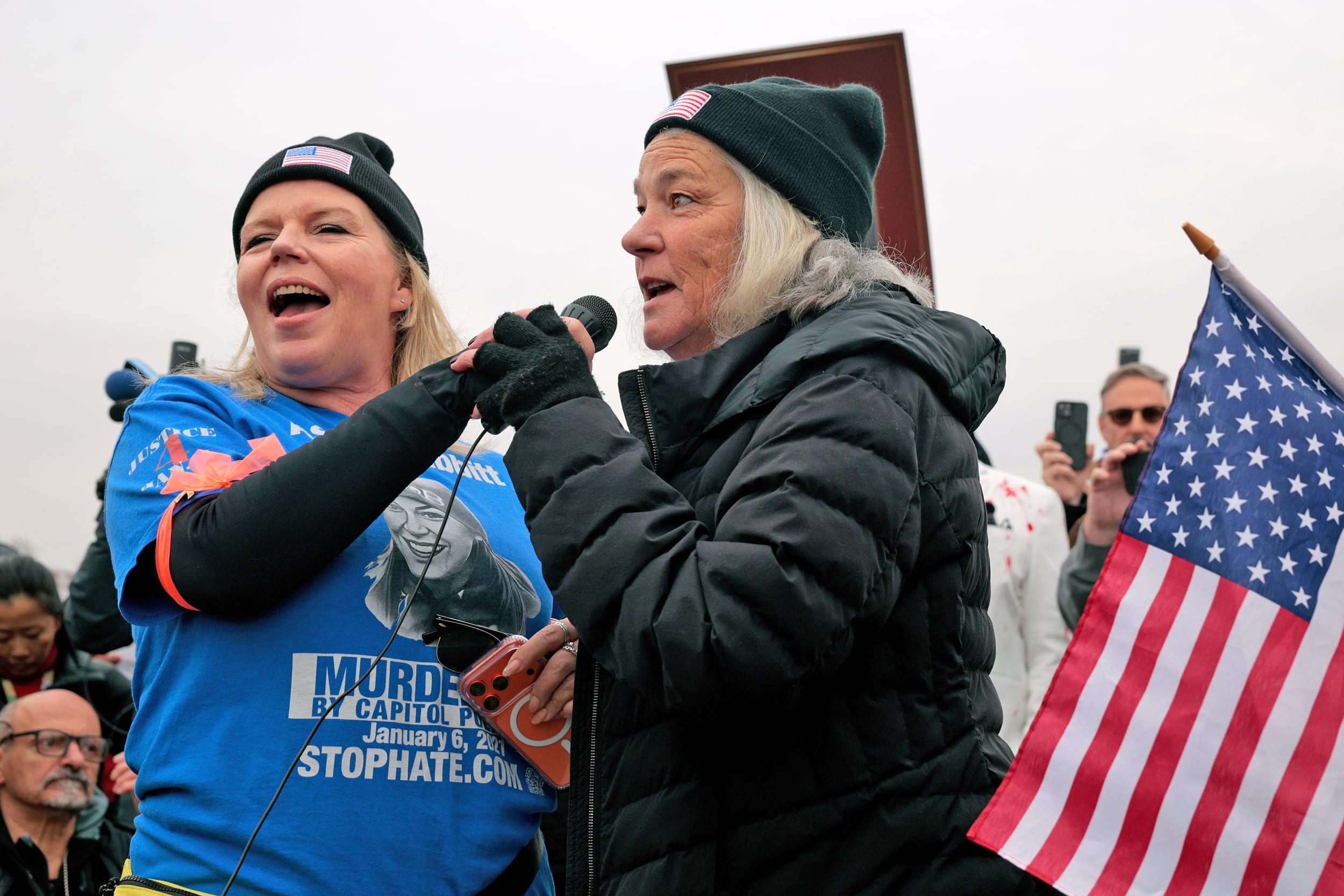 Micki Witthoeft, the mother of Ashli Babbitt, who was killed by Capitol Police on Jan.  6th and Nicole Reffitt, the wife of convicted rioter Guy Reffitt, attend a January 6th memorial march marking five years since the attack on January 6, 2026 in Washington, D.C.