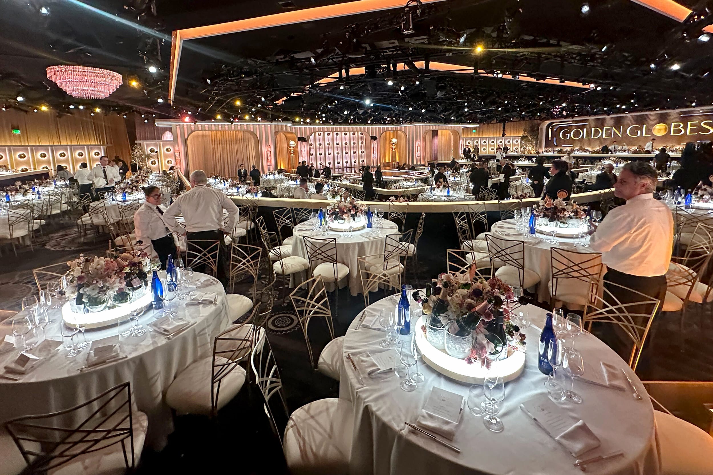 The view of tables and servers inside the Golden Globes.