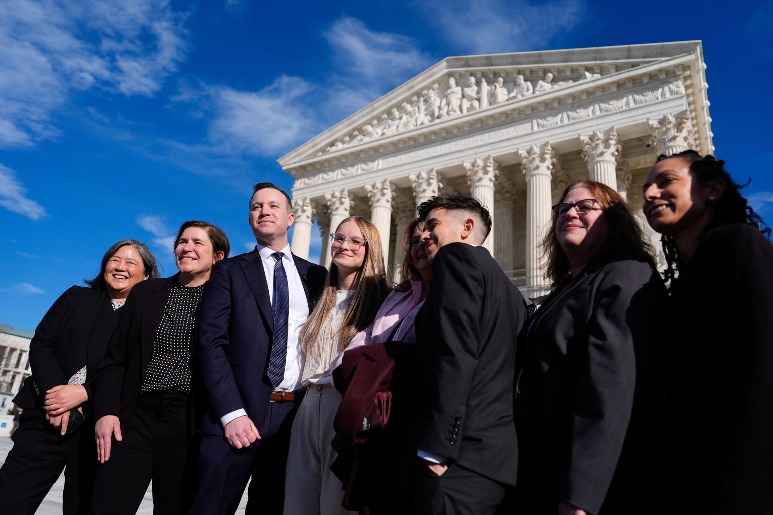 Becky Pepper-Jackson and her mother, Heather Jackson, pose with members of their legal team outside the Supreme Court