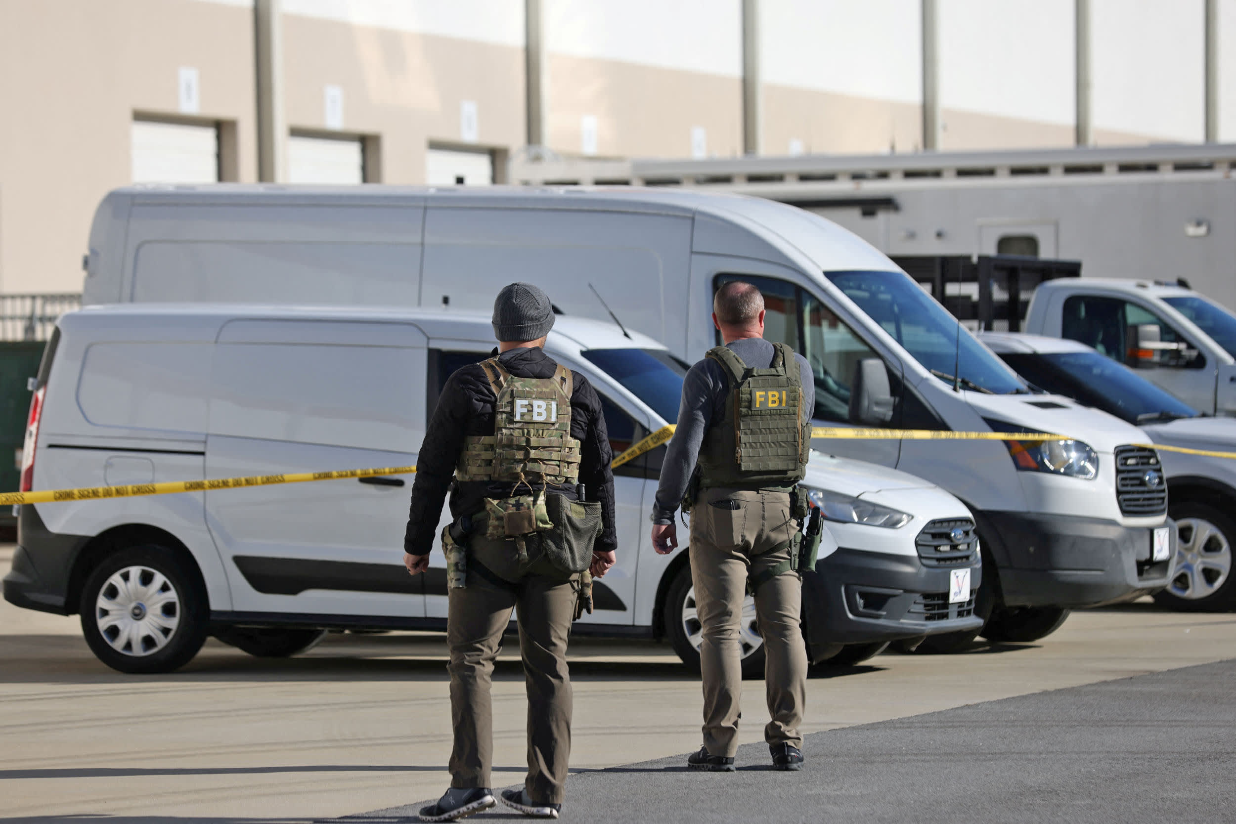 Members of the FBI Evidence Response Team outside the Fulton County Election Hub and Operation Center after the FBI executed a search warrant there in relation to the 2020 election, in Union City, Georgia on Jan. 28, 2026.