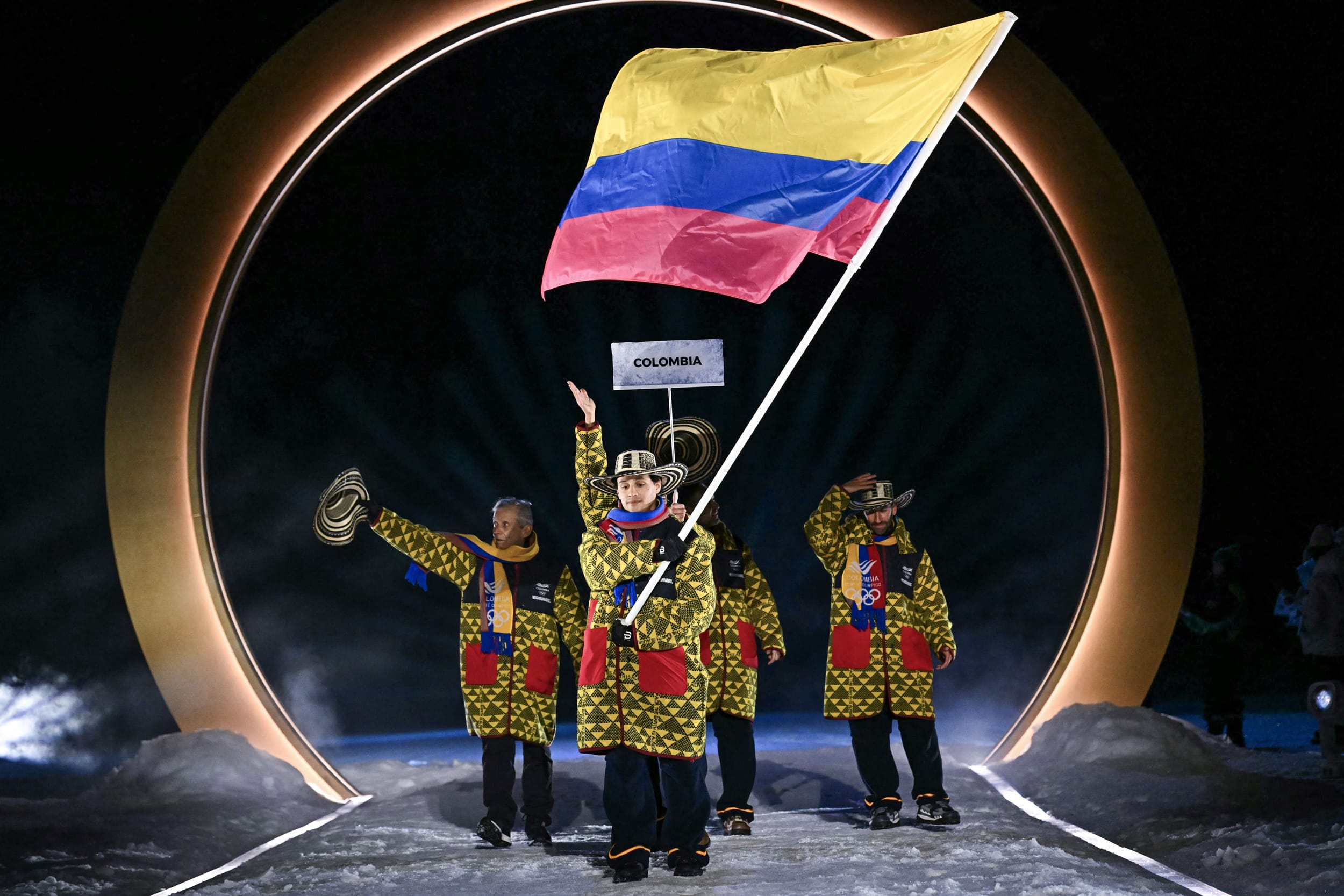 Colombia's flag bearer Fredrik Fodstad parades during the opening ceremony of the Milano Cortina 2026 Winter Olympic Games.