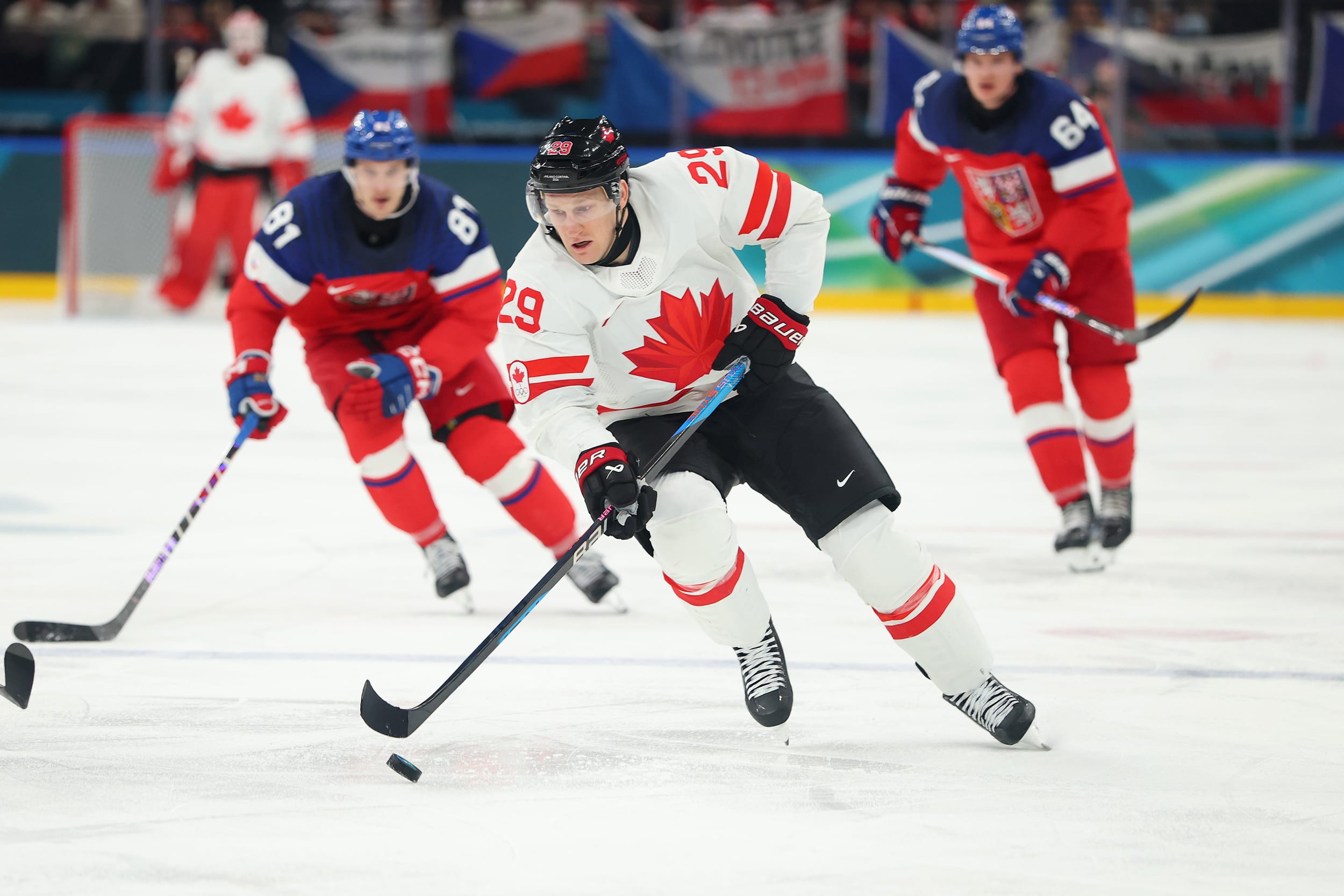 Nathan MacKinnon of Team Canada skates with the puck