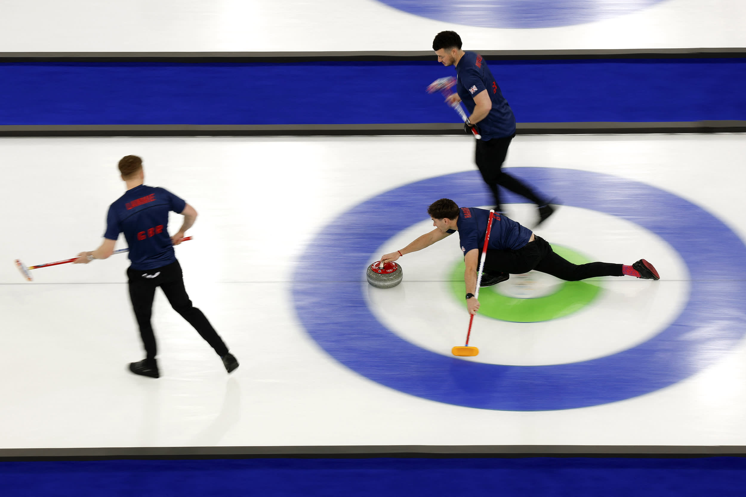 Image: TOPSHOT-CURLING-OLY-2026-MILANO CORTINA-GBR-SWE