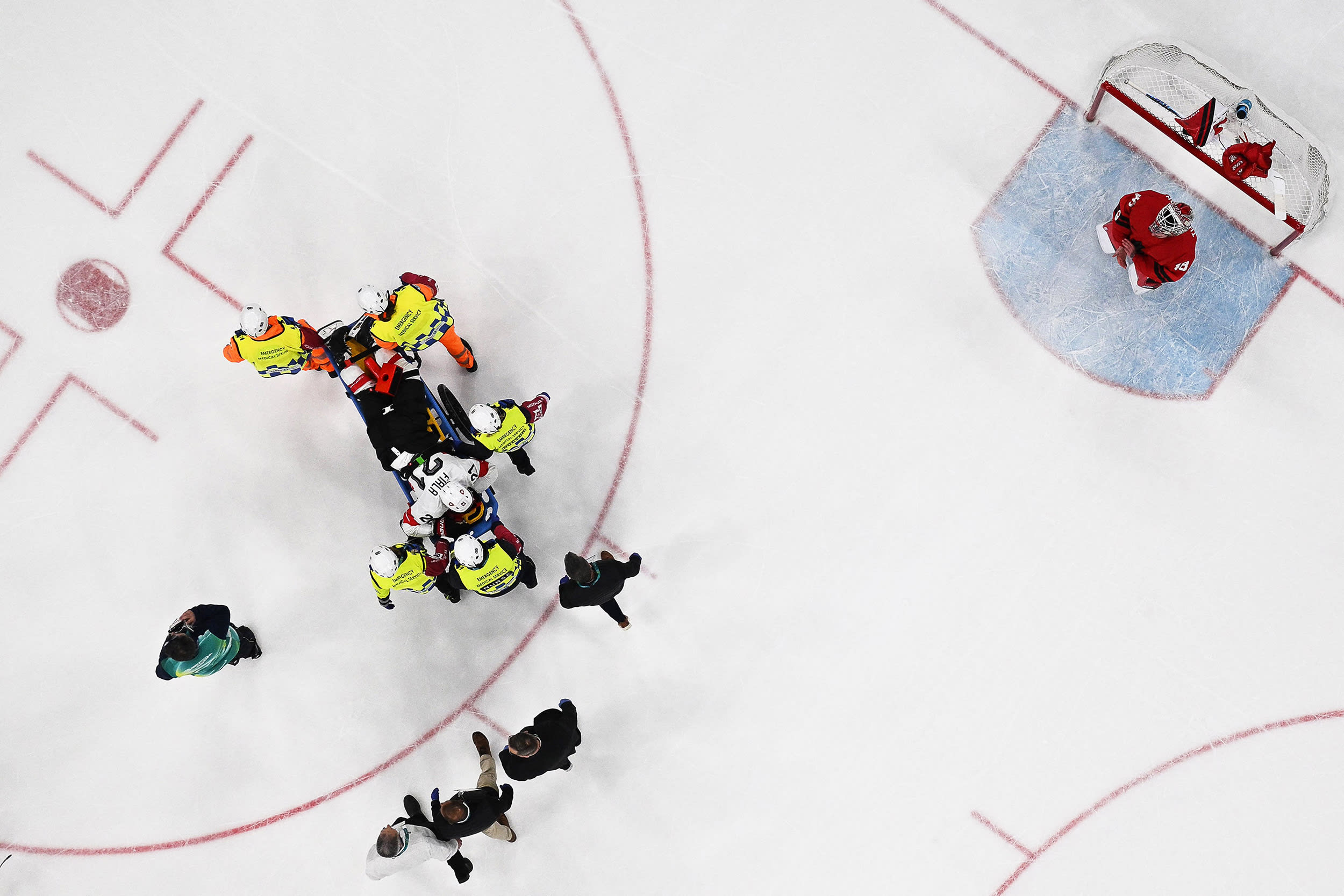 Image: TOPSHOT-IHOCKEY-OLY-2026-MILANO CORTINA-MEN-CAN-SUI