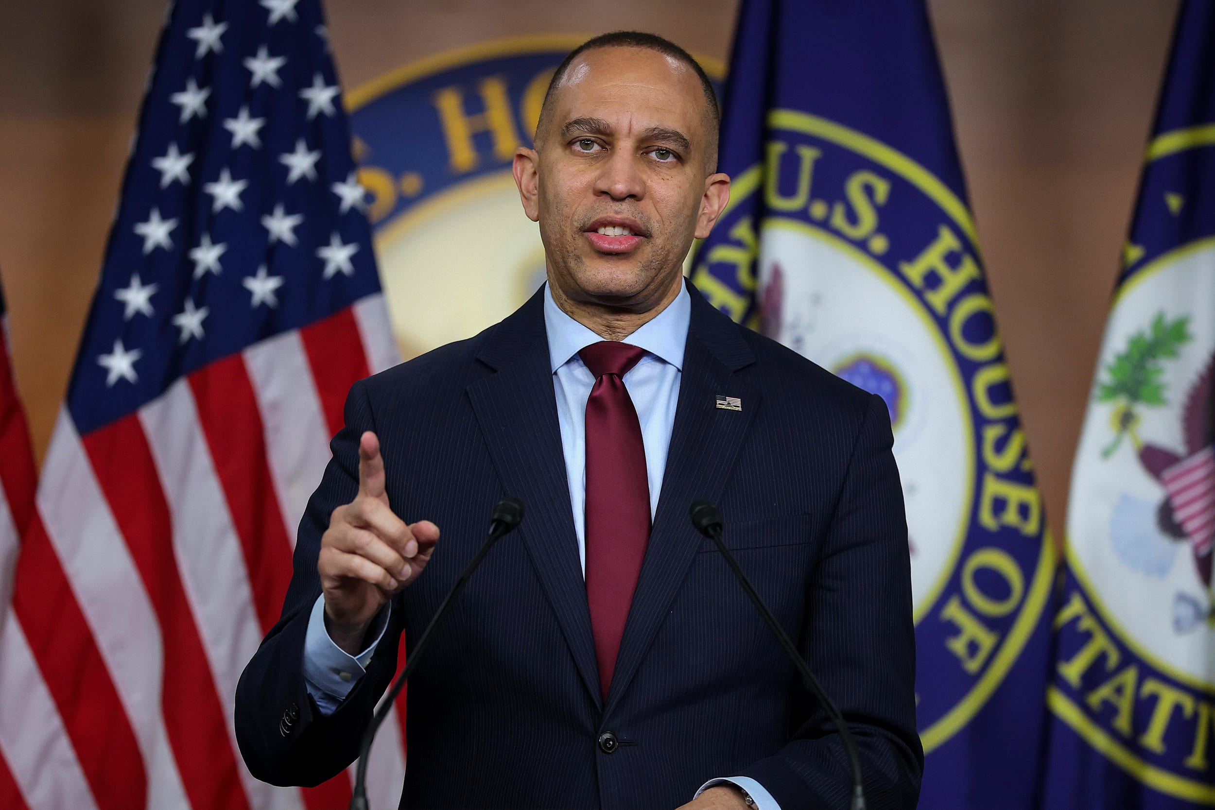 Hakeem Jeffries speaking at a news conference.