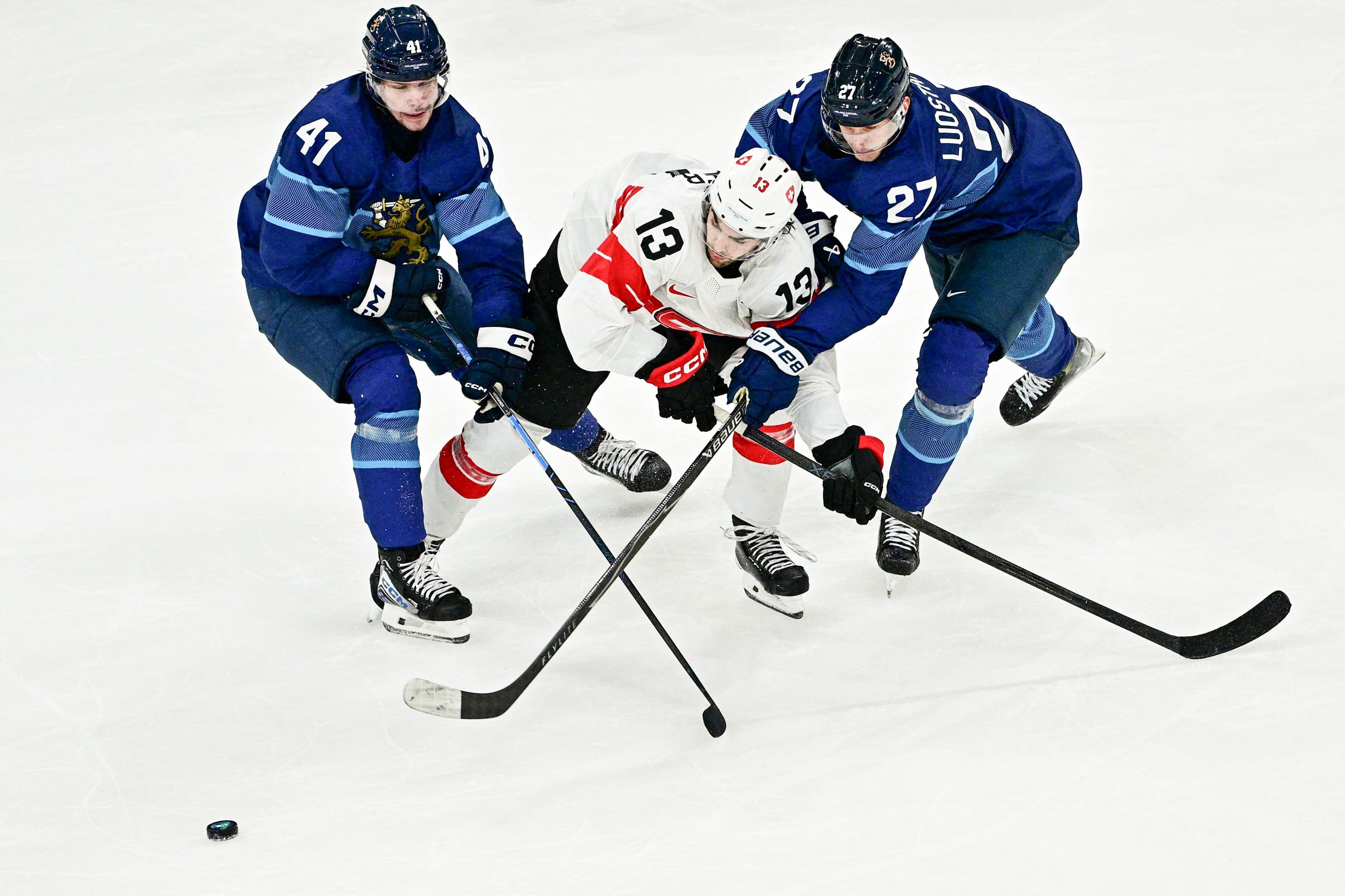 Image: TOPSHOT-IHOCKEY-OLY-2026-MILANO CORTINA-MEN-FIN-SUI