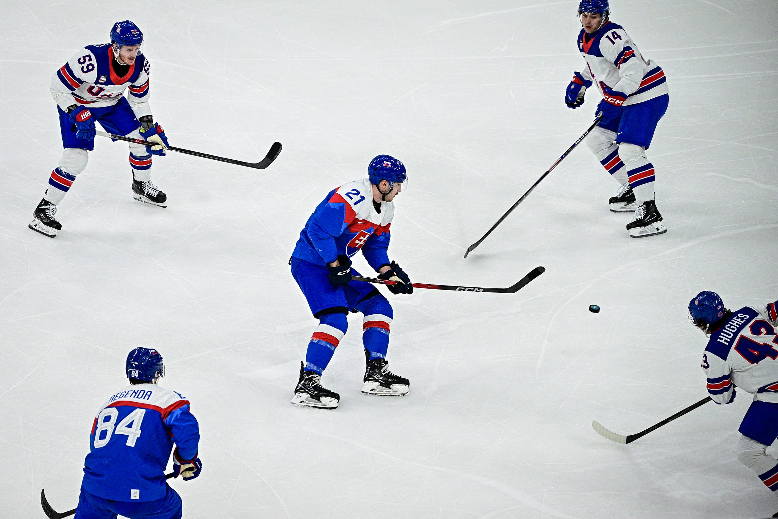 Image: IHOCKEY-OLY-2026-MILANO CORTINA-MEN-USA-SVK