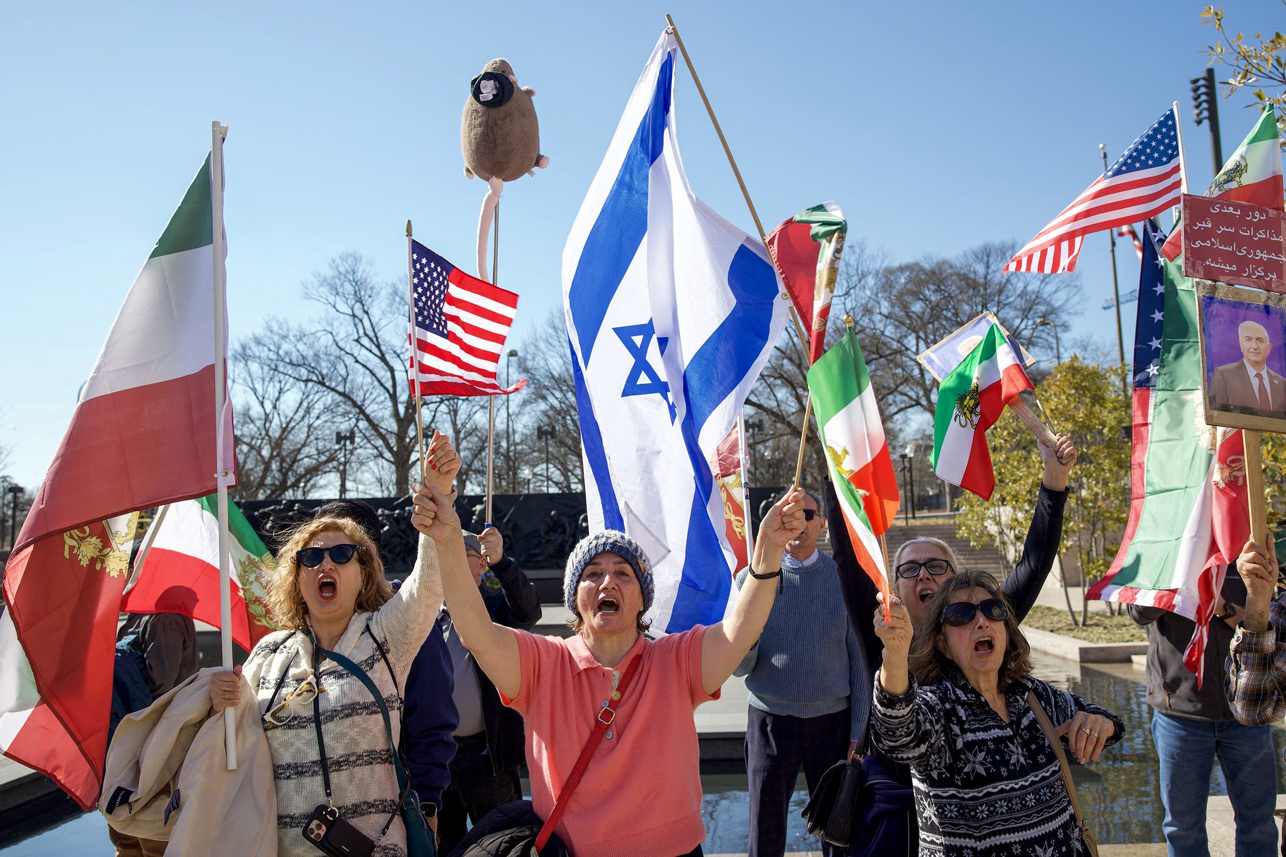 A group of Iranian Americans gather at the World War I Memorial.