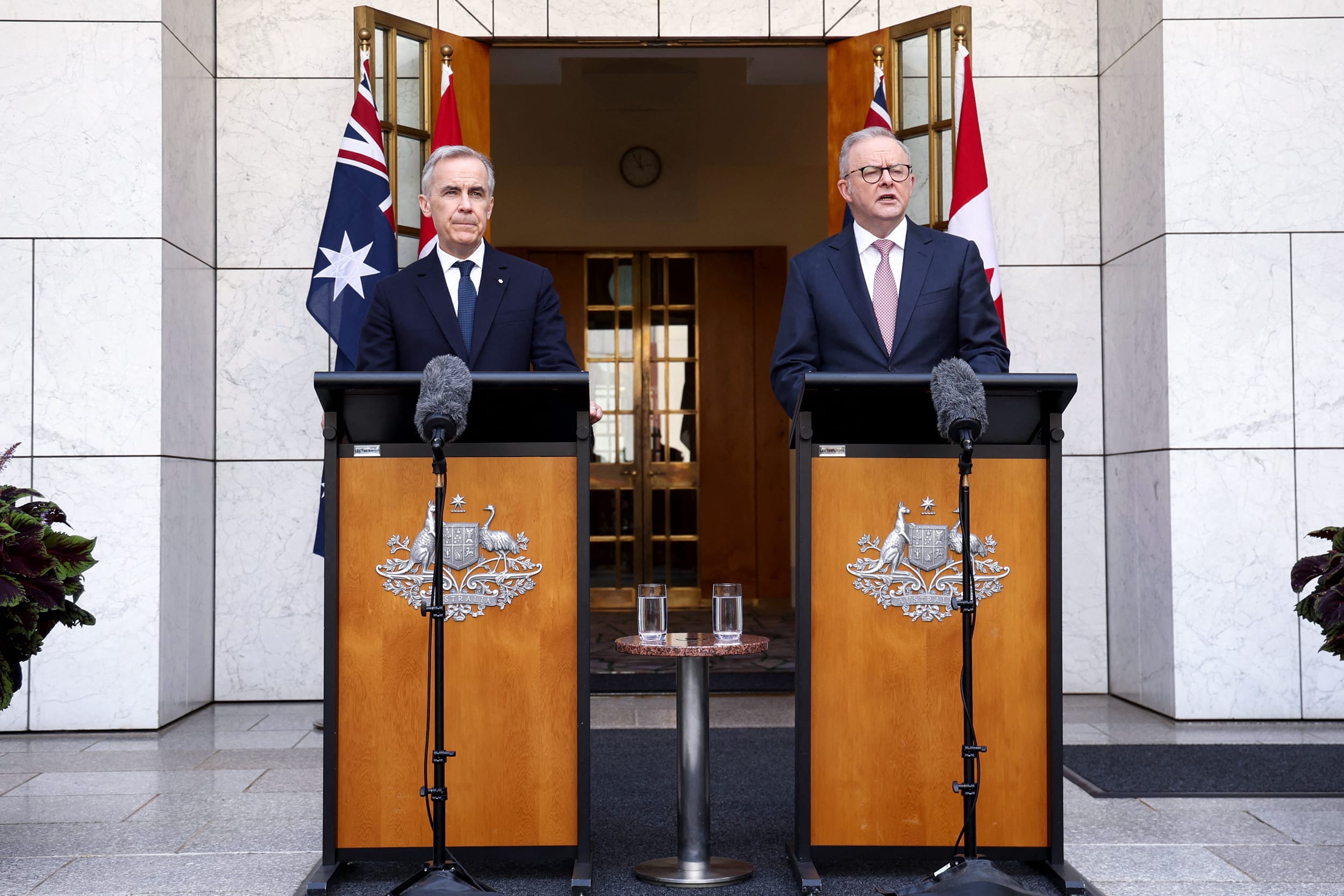 Canada's Prime Minister Mark Carney (L) and Australia's Prime Minister Anthony Albanese during a press conference.