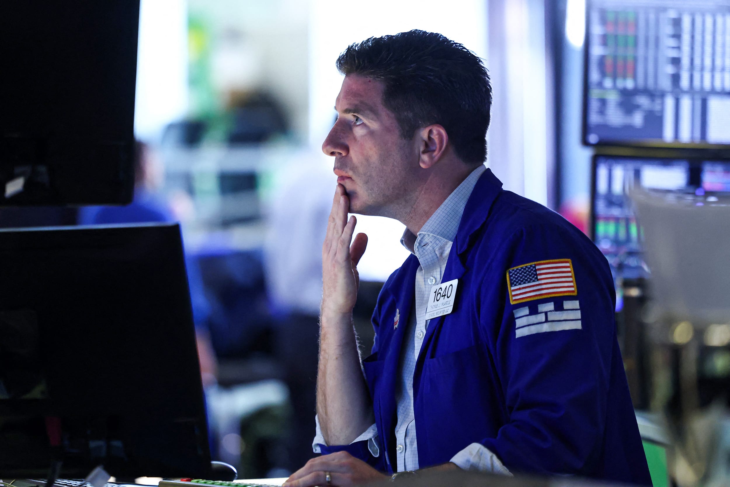 A trader works on the floor of the New York Stock Exchange at the opening bell on March 2, 2026.