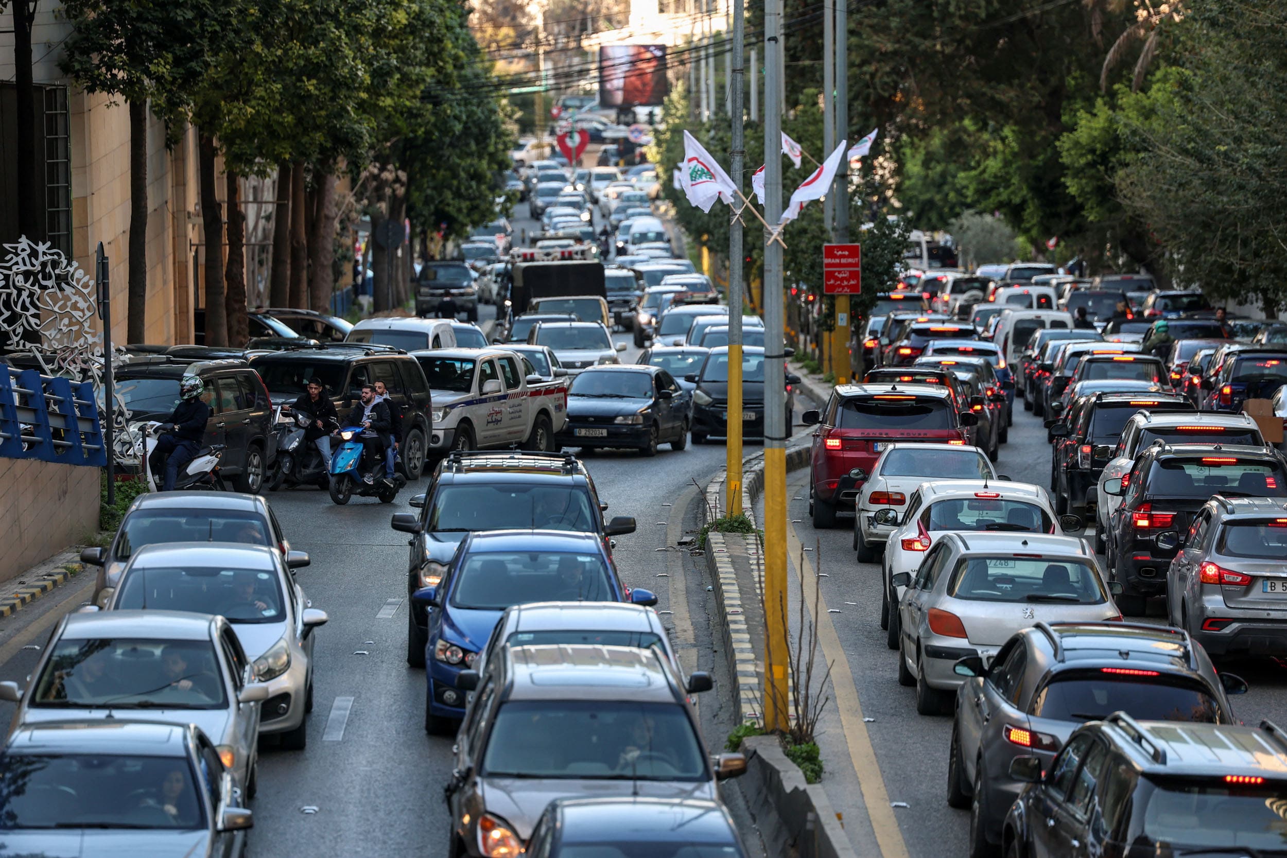 Traffic jam on a street after the Israel's military issued evacuation orders of entire neighborhoods in Beirut's southern suburb