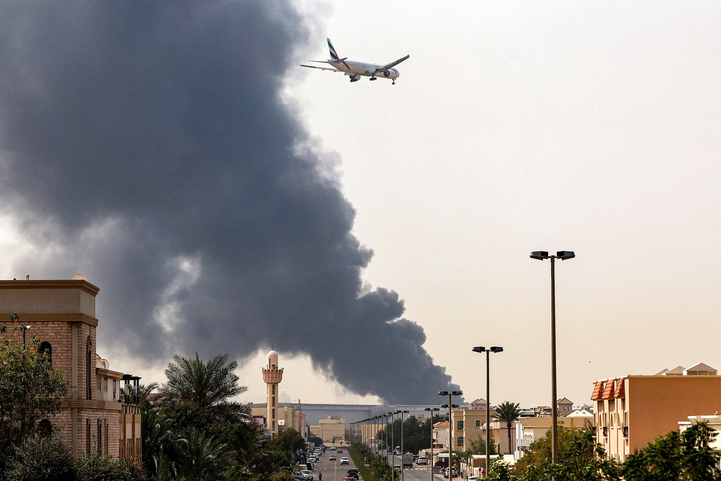 Flights were gradually resuming at Dubai airport on March 16, previously the world's busiest for international flights, the airport operator said, after a "drone-related incident" sparked a fuel tank fire nearby, as Iran kept up its Gulf attacks.