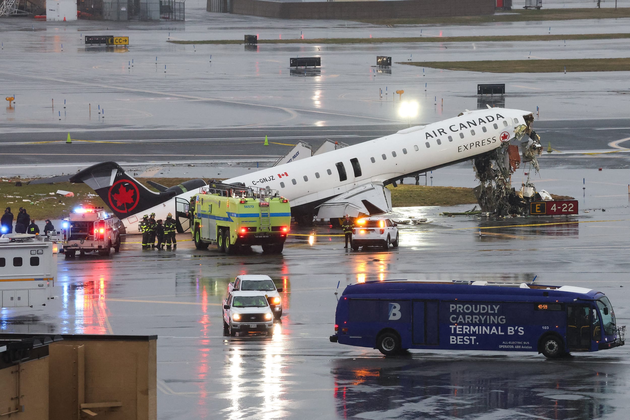 An Air Canada Express CRJ-900 sits on the runway after colliding with a Port Authority fire truck at LaGuardia Airport in New York, on March 23, 2026. 