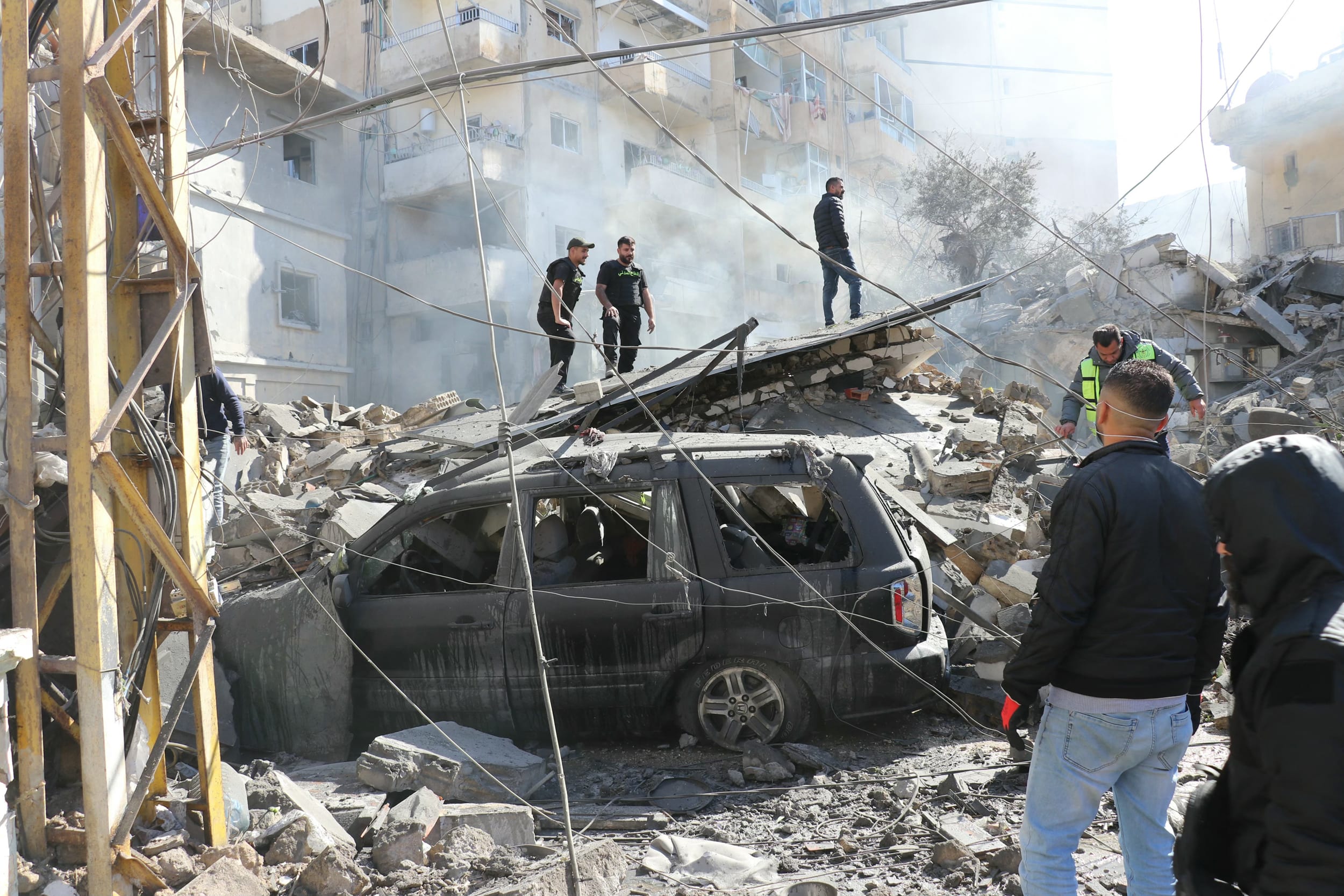 First responders arrive at the site of an Israeli airstrike in Tyre, southern Lebanon, on March 24, 2026. 