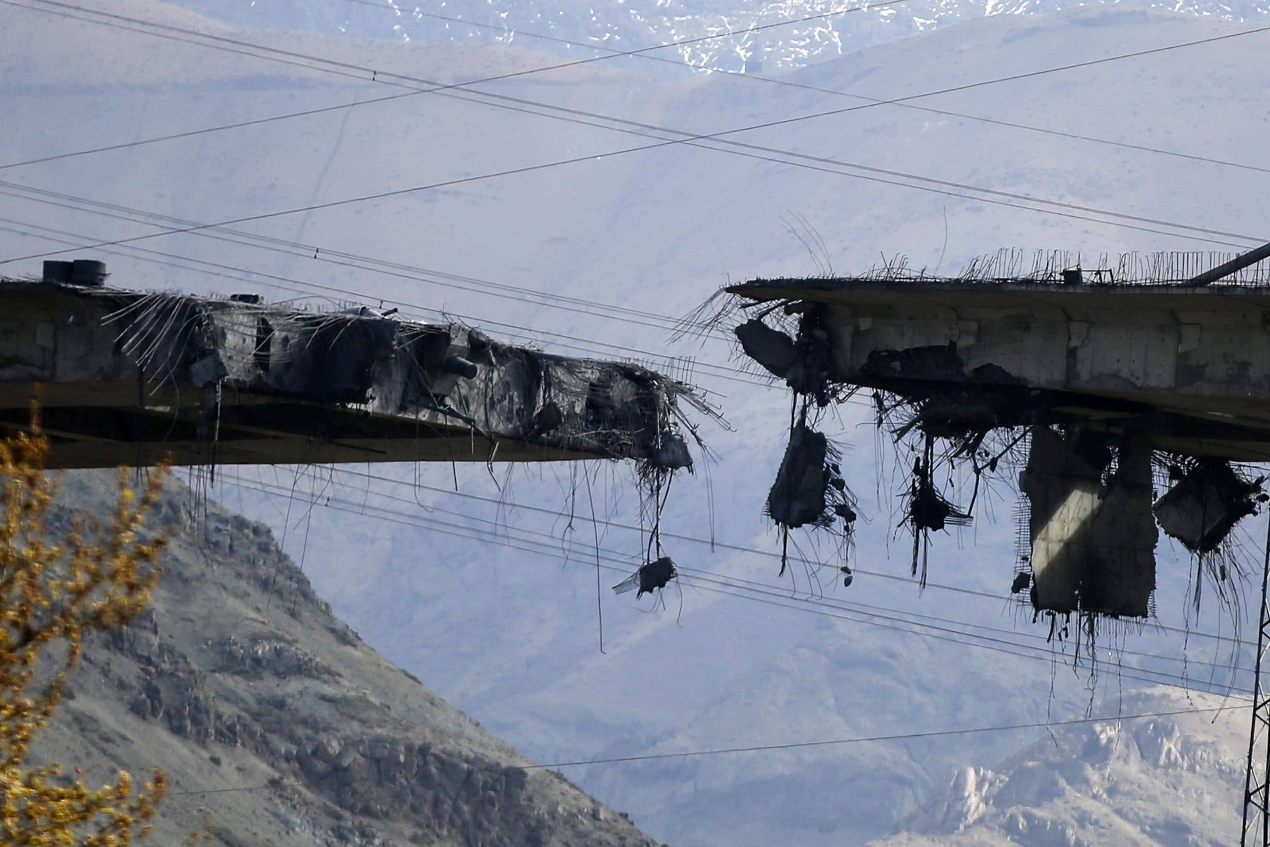 Bridge damaged in repeated strikes near Tehran