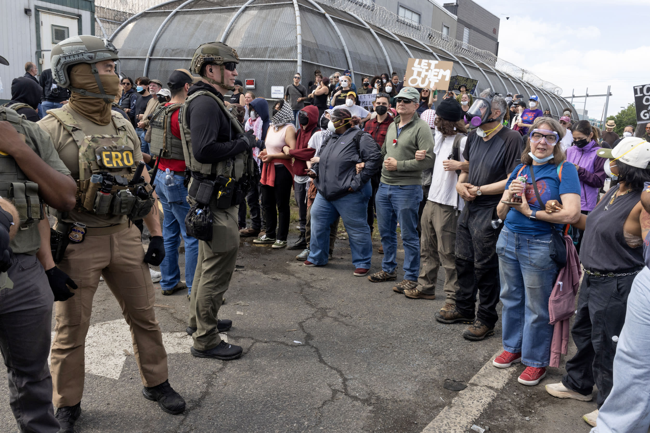 ICE agents and immigration activists clash outside Delaney Hall detention center in Newark, New Jersey