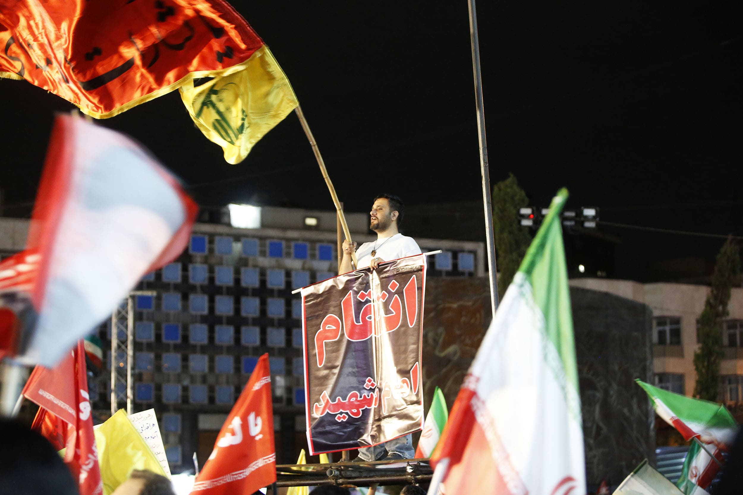 Crowds gather in Tehran to support of government following missile attack on Israel